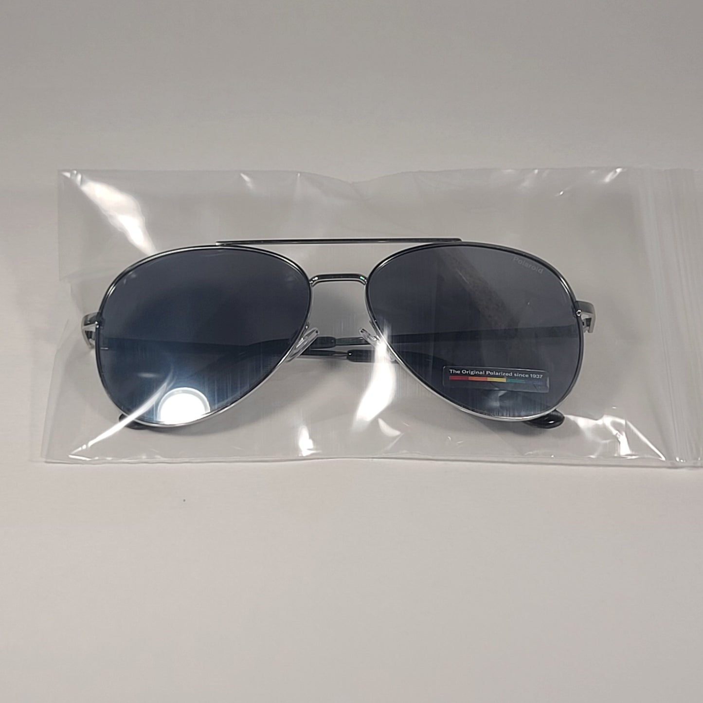 Polaroid POL 02 Polarized Aviator Pilot Sunglasses Silver Tone Frame Gray Mirror Lens - Sunglasses