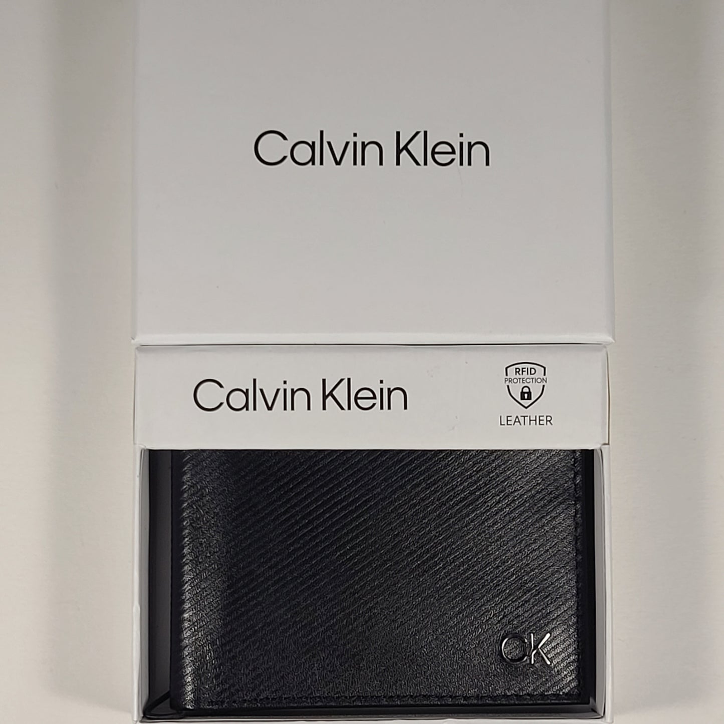 Calvin Klein Men’s Bifold Black Leather RFID Passcase Wallet 31KA220037 - Wallets