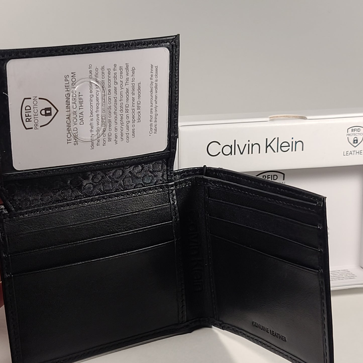 Calvin Klein Men’s Bifold Black Leather RFID Passcase Wallet 31KA220037 - Wallets
