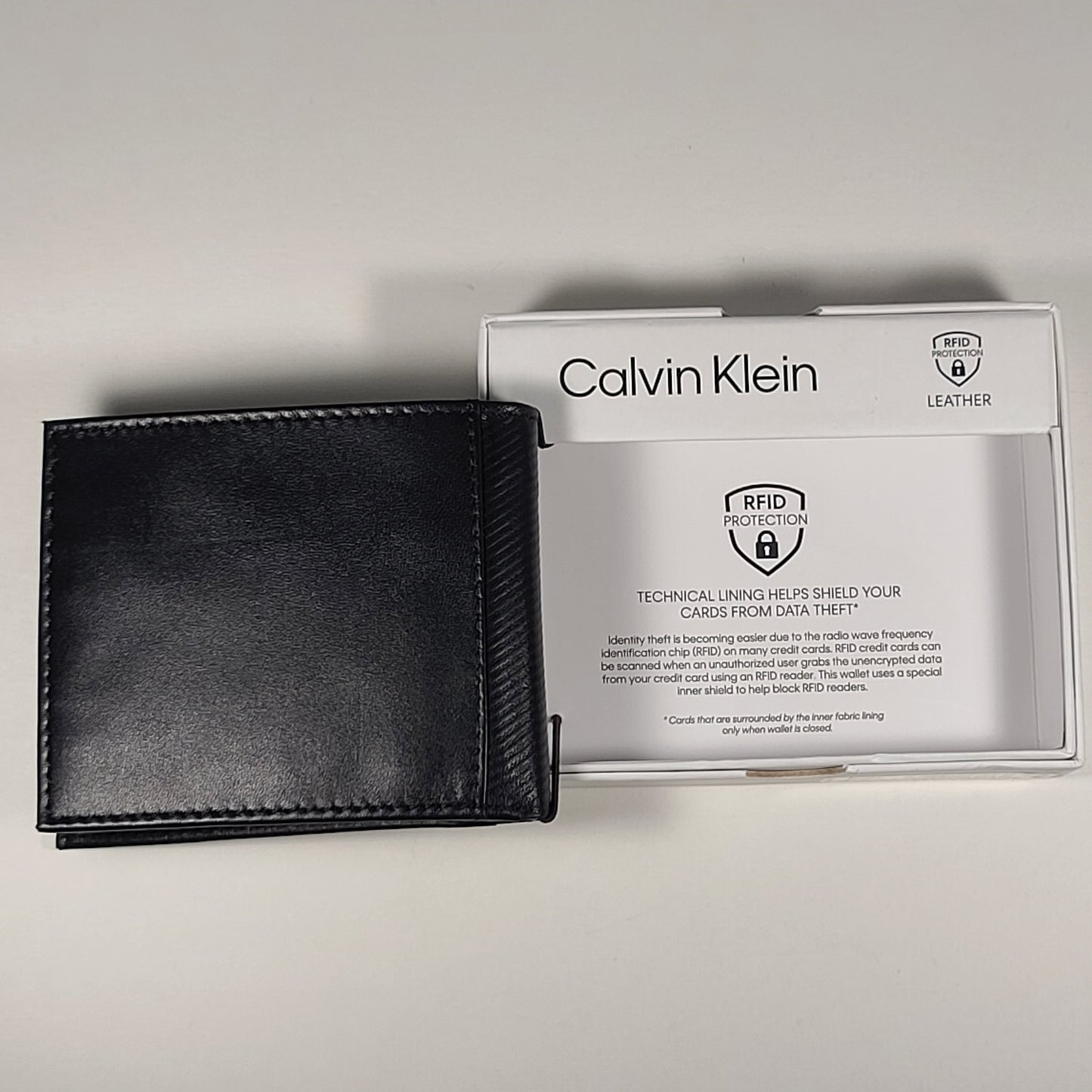 Calvin Klein Men’s Bifold Black Leather RFID Passcase Wallet 31KA220037 - Wallets