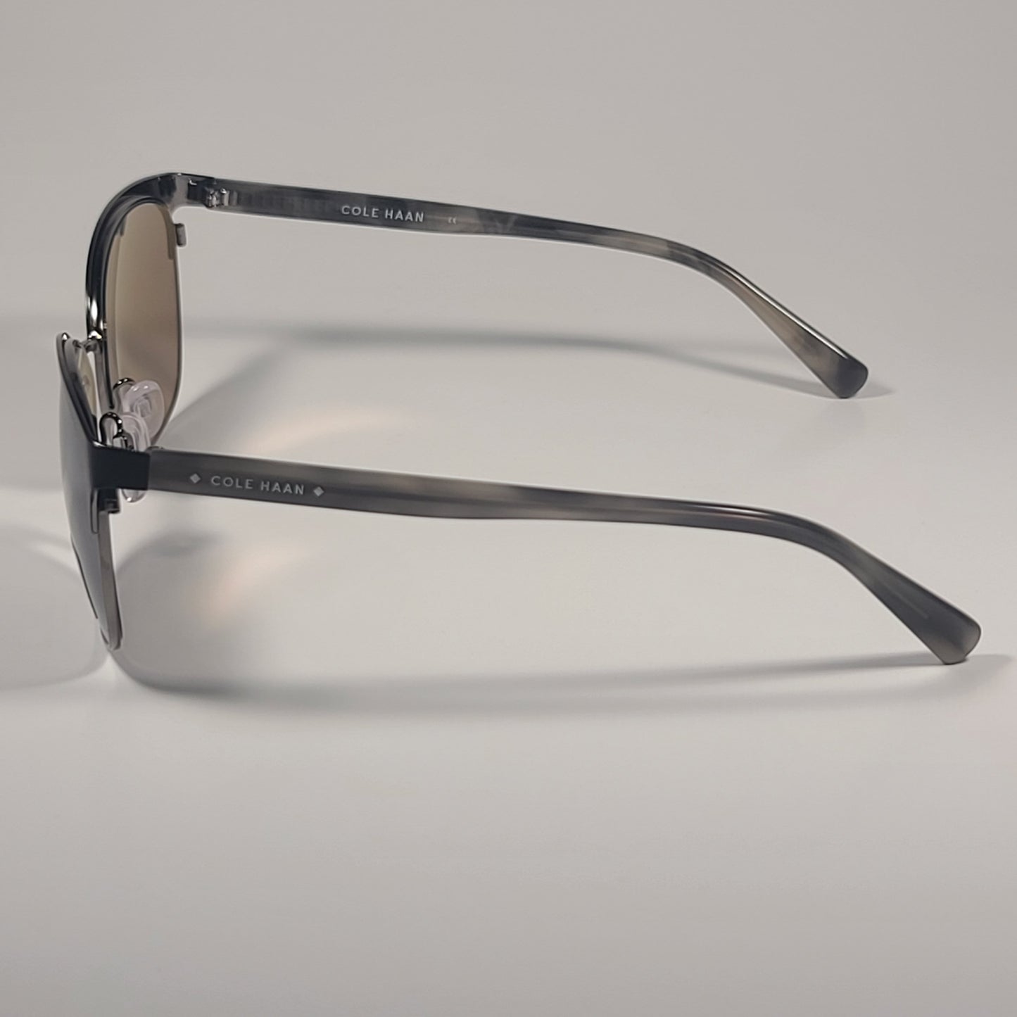 Cole Haan CH7044 001 Cat Eye Sunglasses Black Gray Frame Gray Mirror Lens 57mm