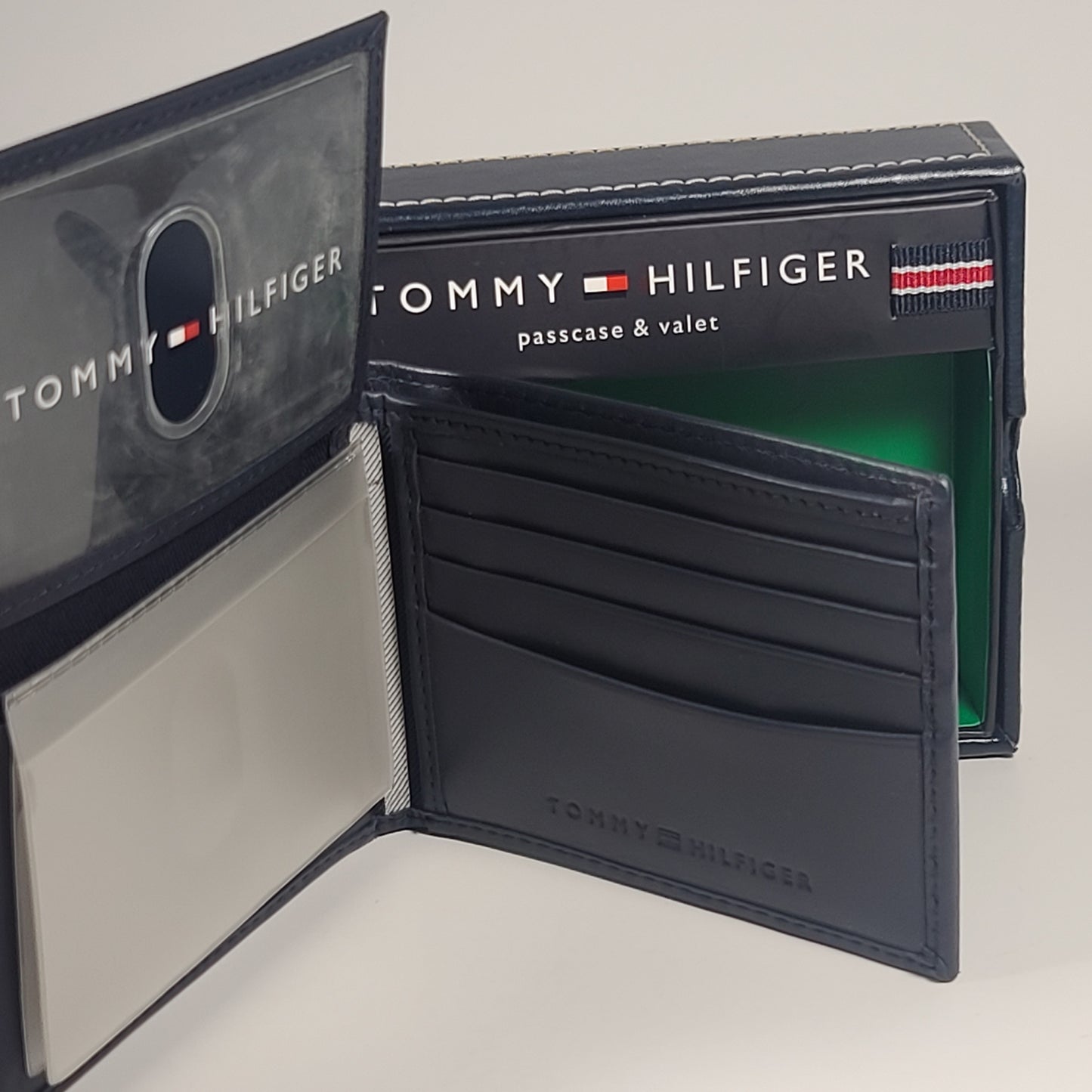 Tommy Hilfiger Men’s Bifold Navy Leather Passcase And Valet Wallet 31TL22X046 - Wallets