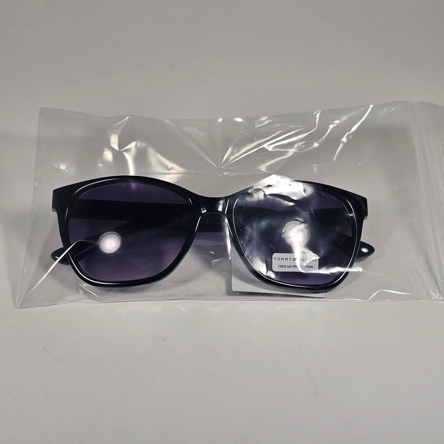 Tommy Hilfiger WP OL670 Oval Sunglasses Shiny Black Frame Smoke Gradient Lens