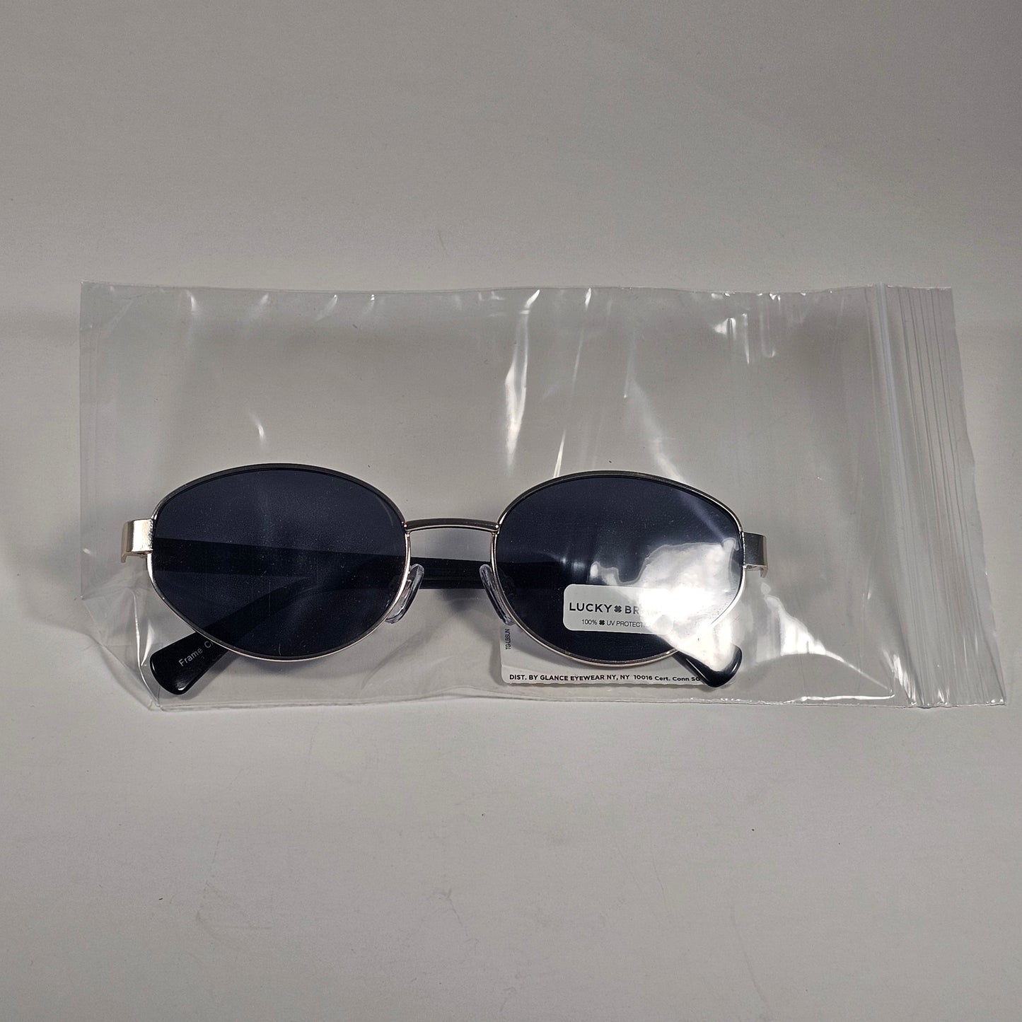 Lucky Brand LB92369 Small Oval Sunglasses Silver Black Frame Gray Tinted Lens