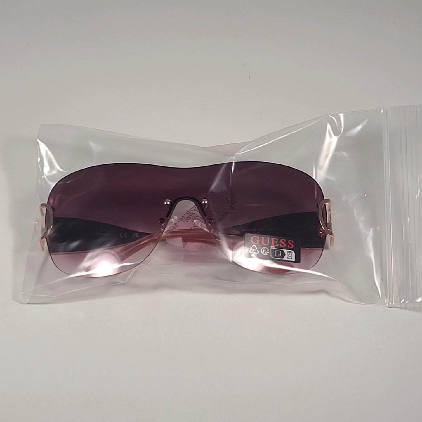 Guess GO00038 28T Rimless Shield Sunglasses Rose Gold Frame Pink Gradient Lens - Sunglasses