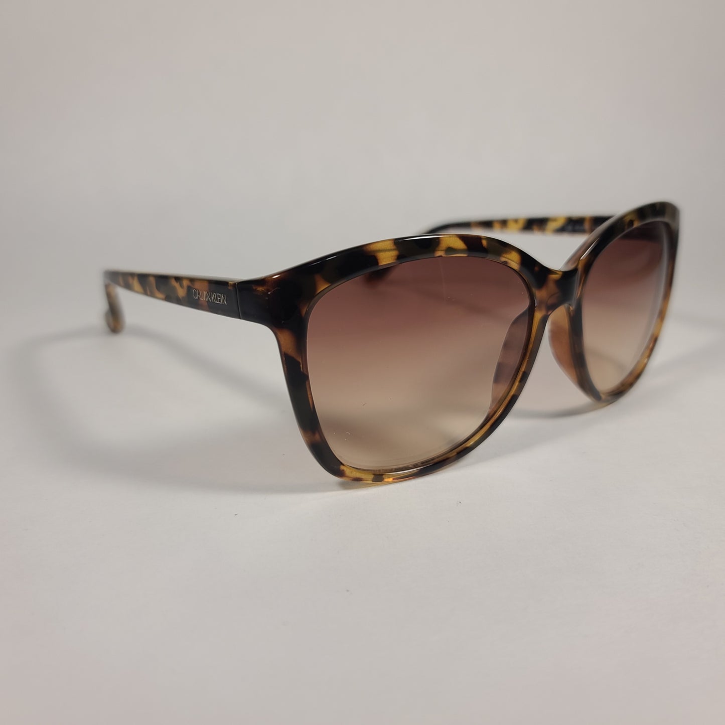 Calvin Klein Cat Eye Sunglasses CK19542S 235 Brown Tortoise Frame Brown Gradient Lens - Sunglasses