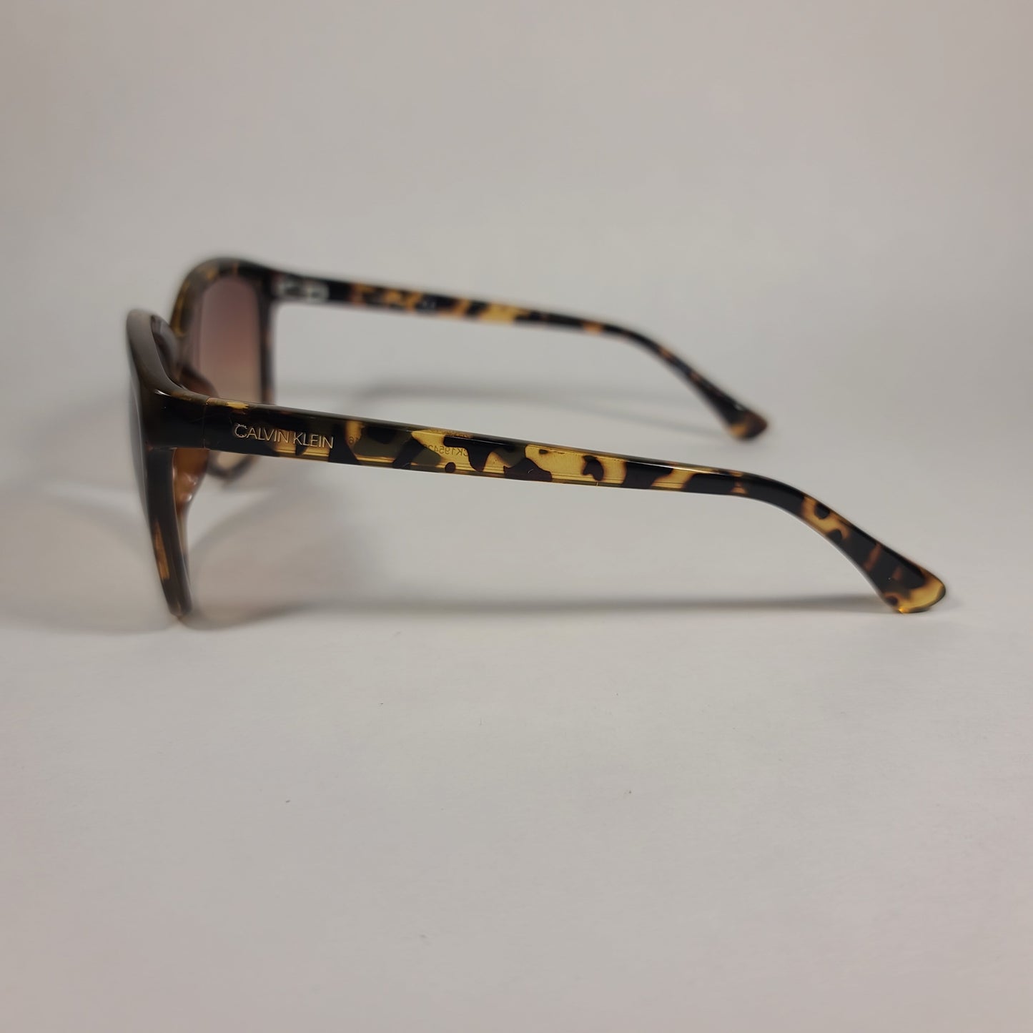 Calvin Klein Cat Eye Sunglasses CK19542S 235 Brown Tortoise Frame Brown Gradient Lens - Sunglasses