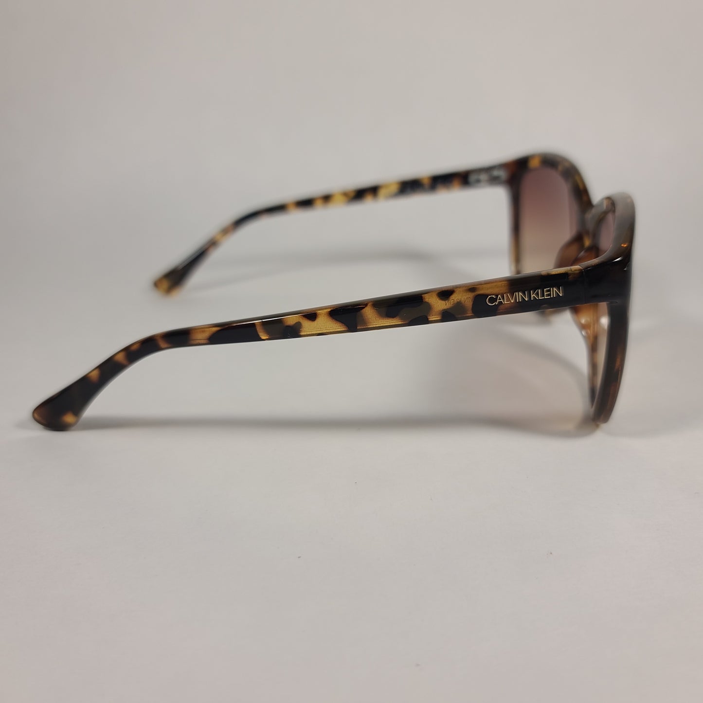 Calvin Klein Cat Eye Sunglasses CK19542S 235 Brown Tortoise Frame Brown Gradient Lens - Sunglasses