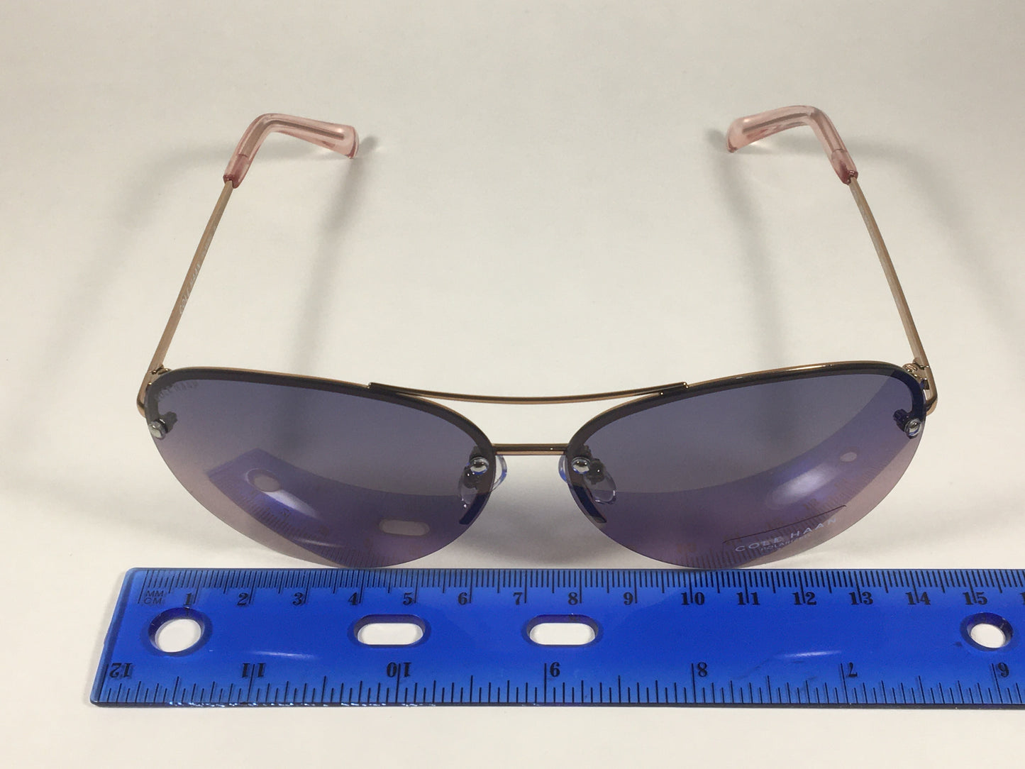 Cole Haan Polarized Rimless Aviator Sunglasses Rose Gold Frame Purple Pink Gradient Lens CH7033 605 ROSE GOLD/PINK - Sunglasses