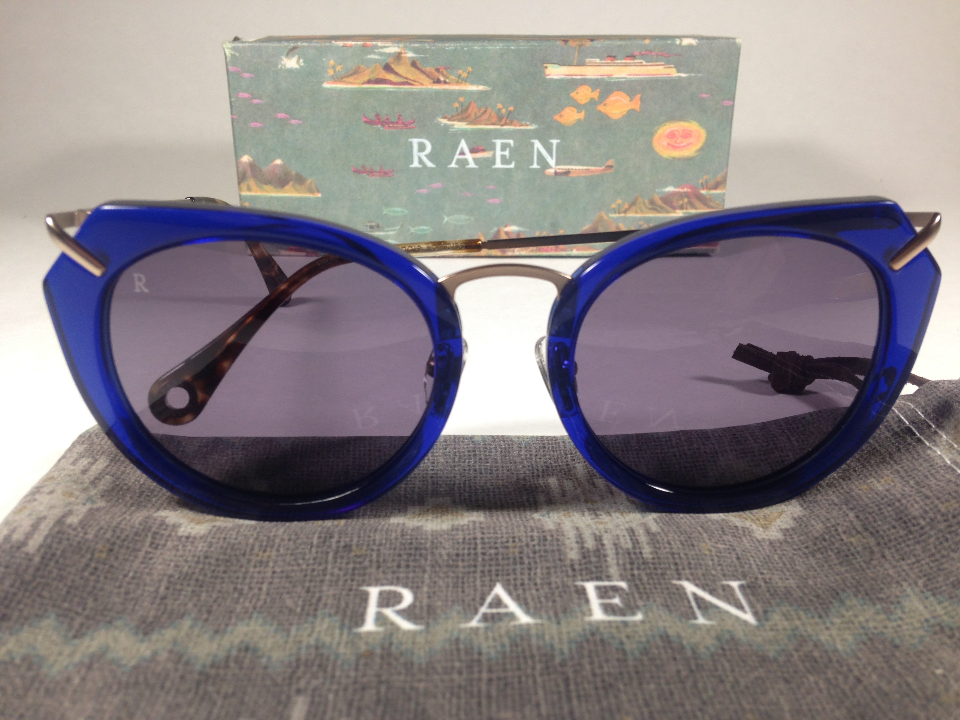 RAEN Pogue Blue Crystal Sunglasses Cat Eye Brindle Gold Smoke Gray