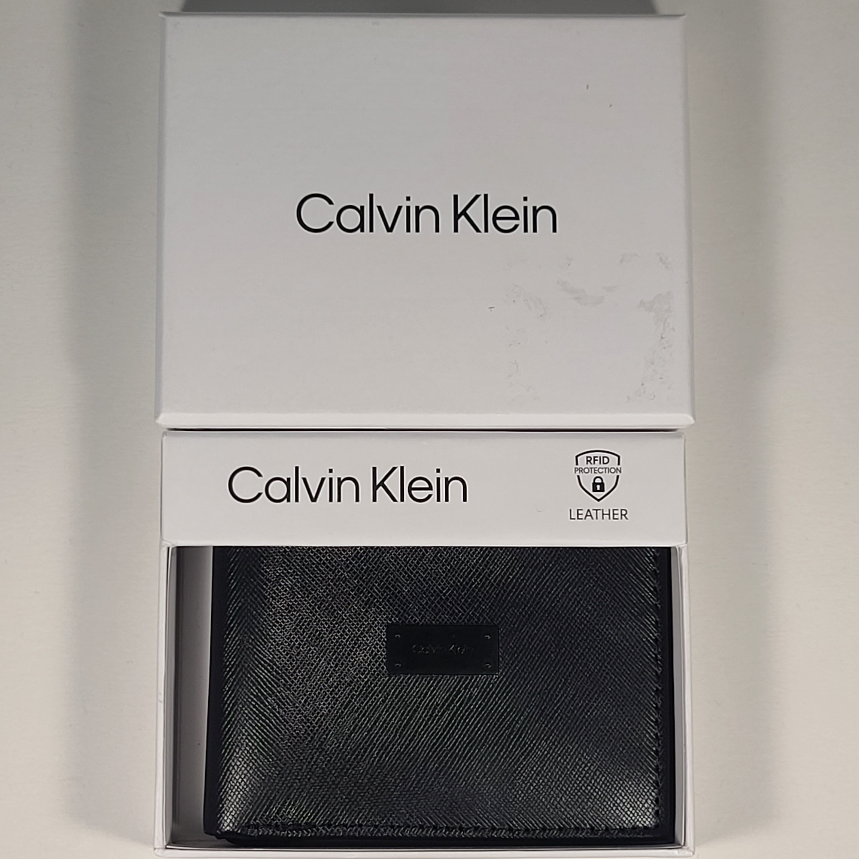 Calvin Klein Men s Bifold Black Leather RFID Passcase Wallet 31KA220033
