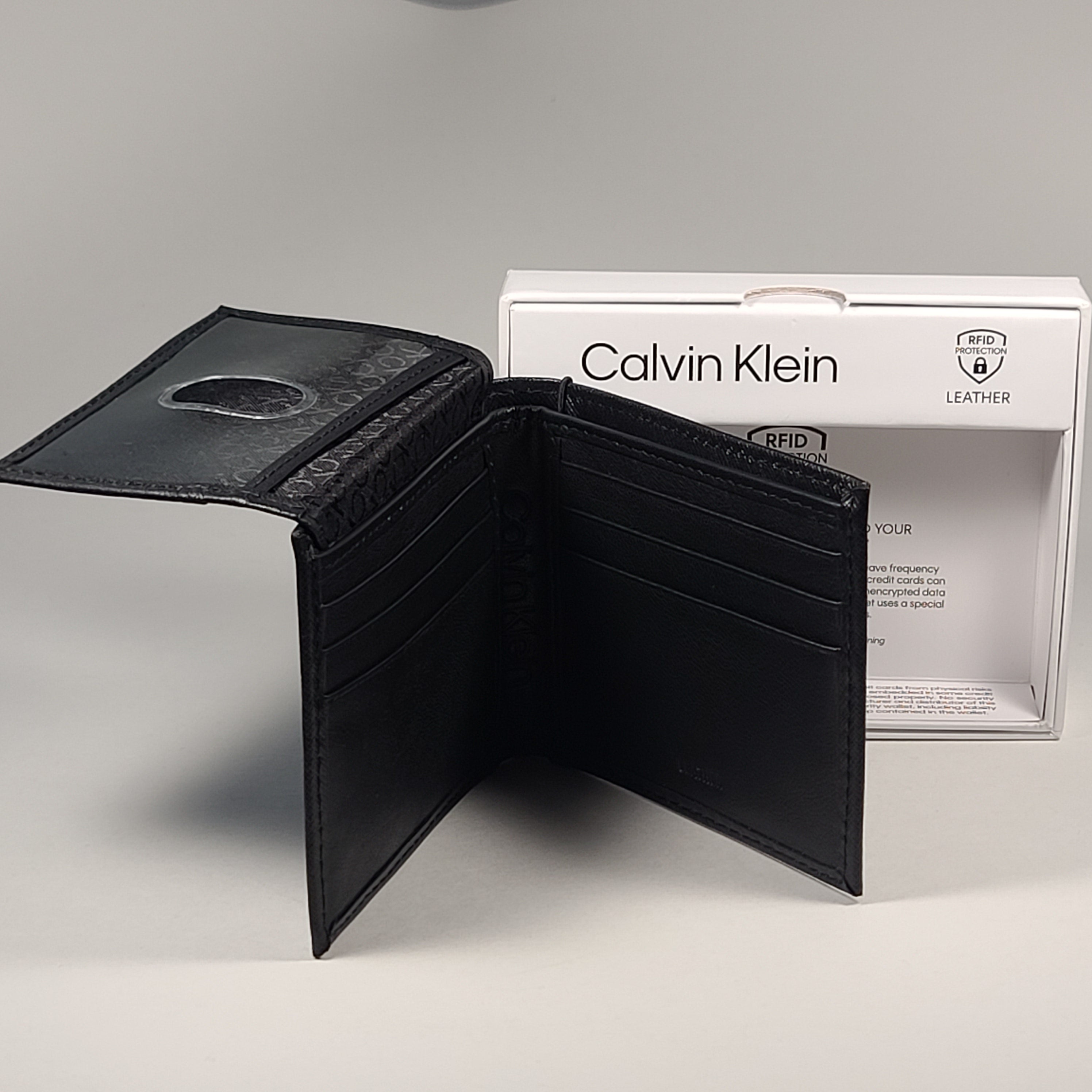 Calvin Klein Men s Bifold Black Leather RFID Passcase Wallet 31KA220033
