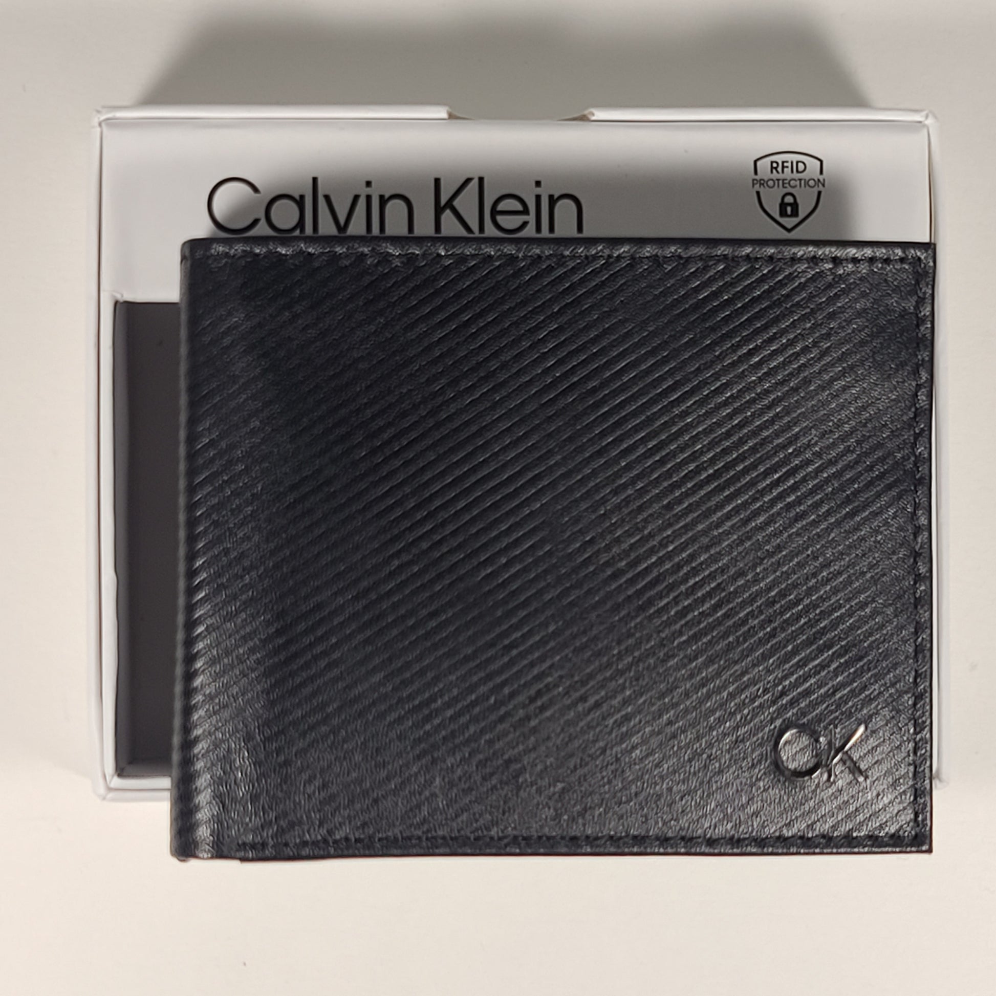 Calvin Klein Men’s Bifold Black Leather RFID Passcase Wallet 31KA220037 - Wallets