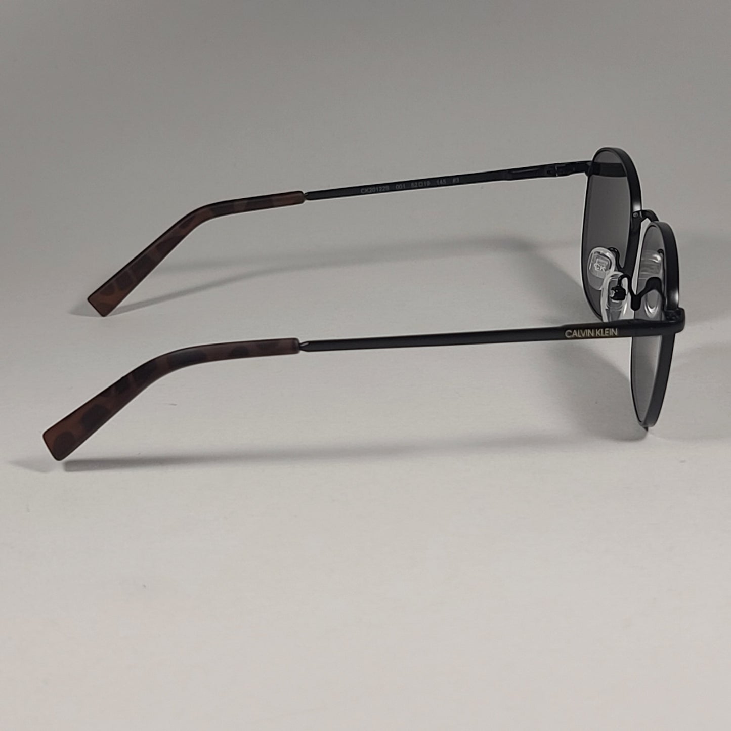 Calvin Klein CK20122S 001 Designer Sunglasses Matte Black With Green Tinted Lens