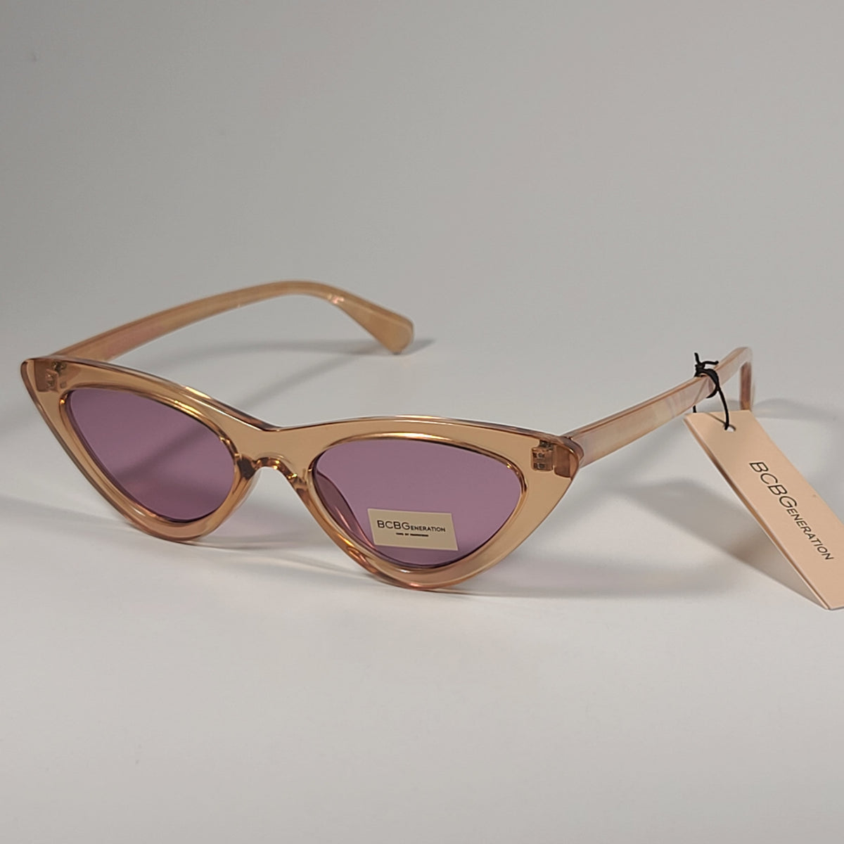 Authentic, BCBGeneration Rose Gold Frame Sunglasses with Burgundy Lenses BCBGeneration Women main image 3