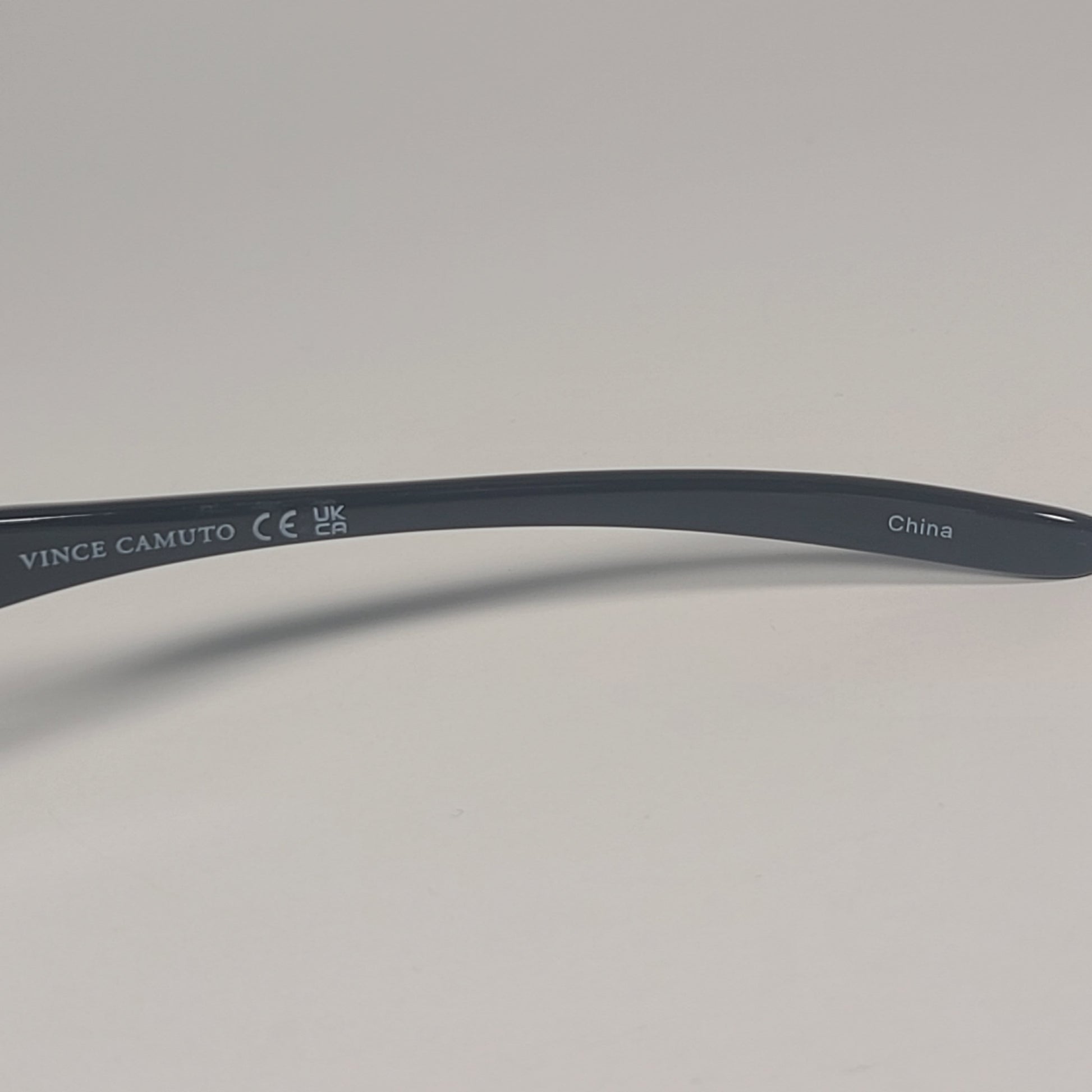 Vince Camuto VM609 GUN Rimless Wrap Sunglasses Gunmetal Black Frame Smoke Gradient Lens - Sunglasses