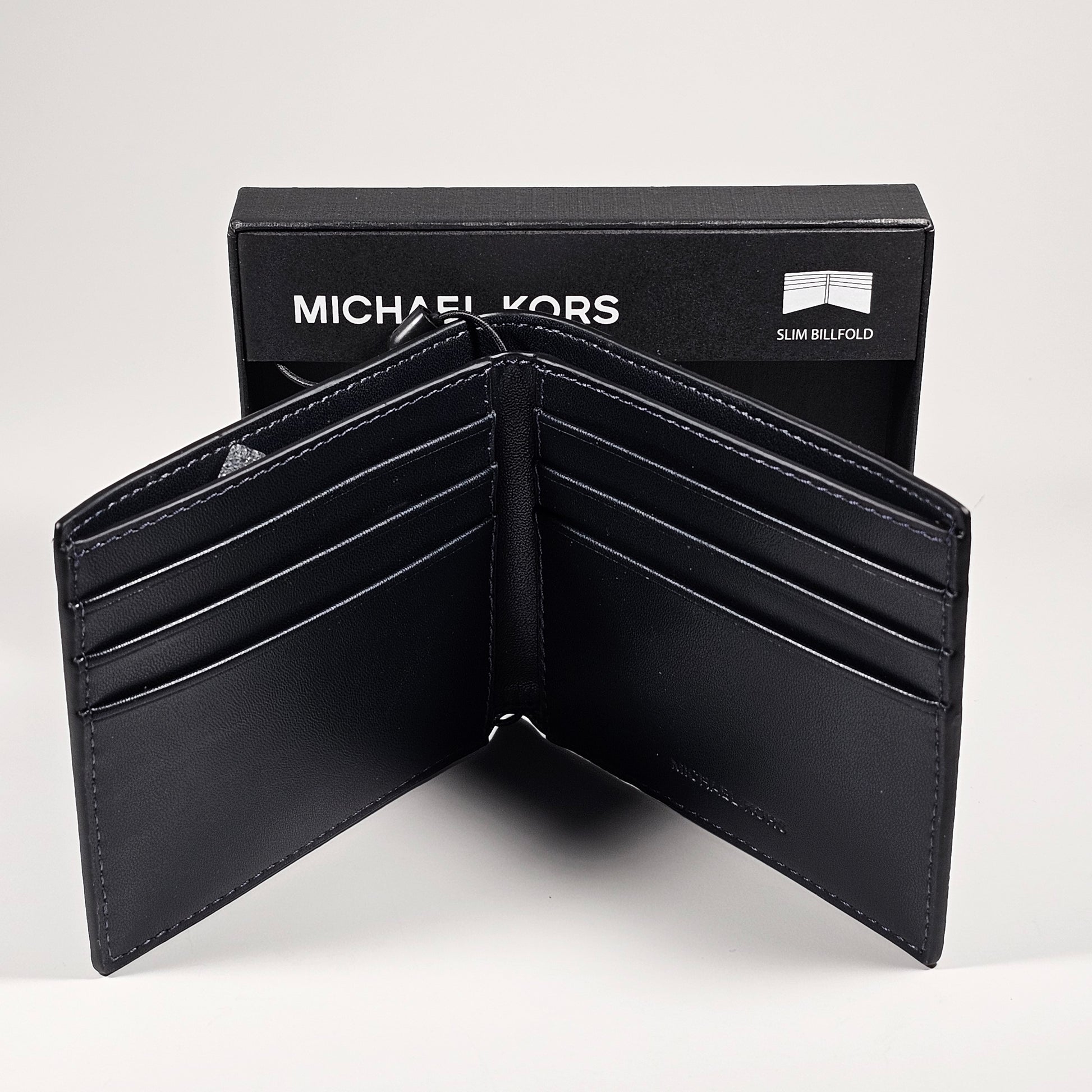 Michael Kors Men’s ’Jet Set’ Bifold Admiral And Pale Blue MK Canvas Slim Wallet 86F5SMNF5B - Wallets