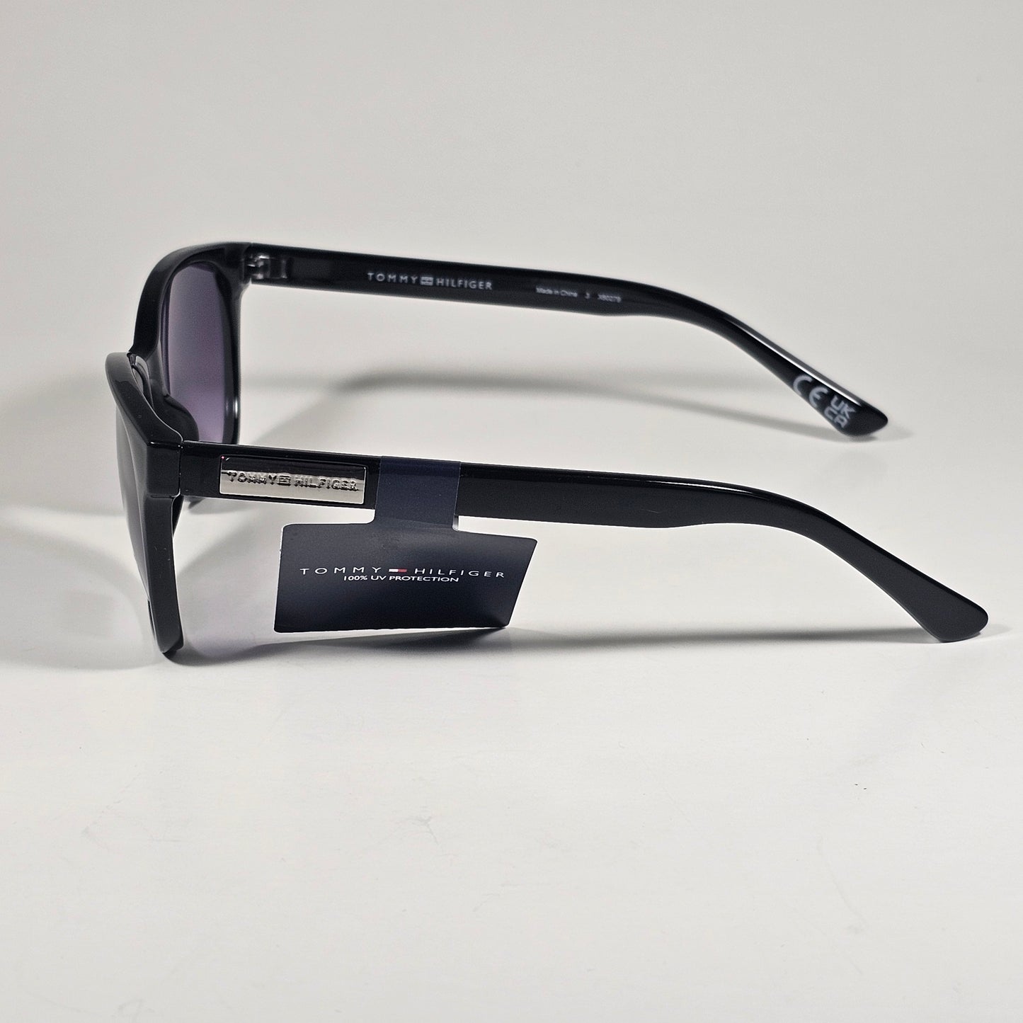Tommy Hilfiger WP OL670 Oval Sunglasses Shiny Black Frame Smoke Gradient Lens