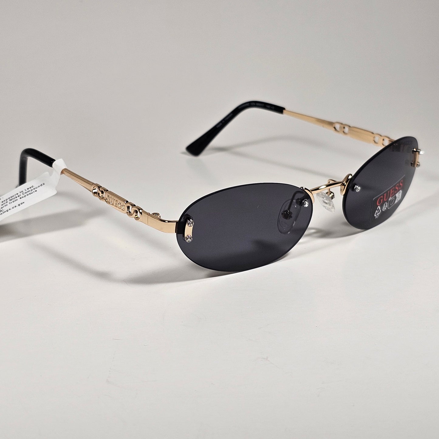 Guess GO00082 32A Small Rimless Oval Sunglasses Gold Frame Gray  Tinted Lens