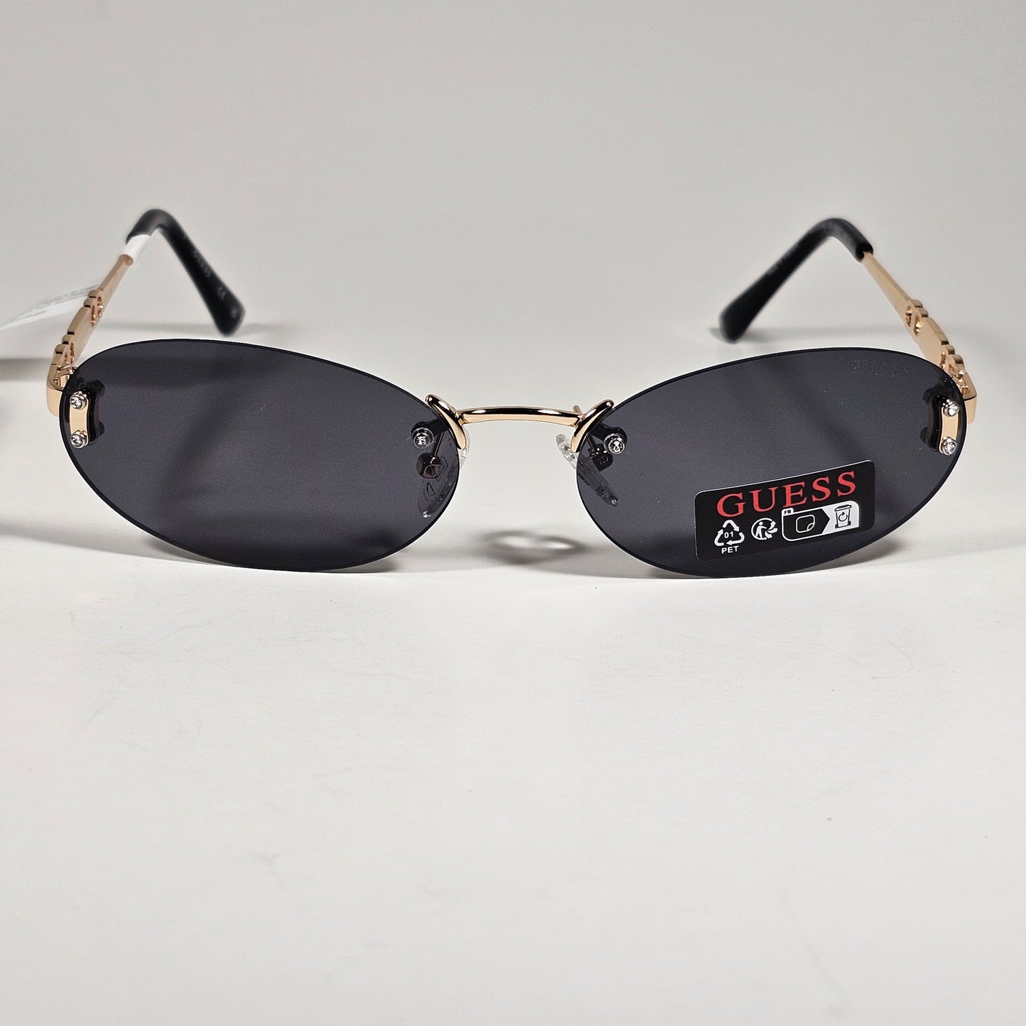 Guess GO00082 32A Small Rimless Oval Sunglasses Gold Frame Gray  Tinted Lens