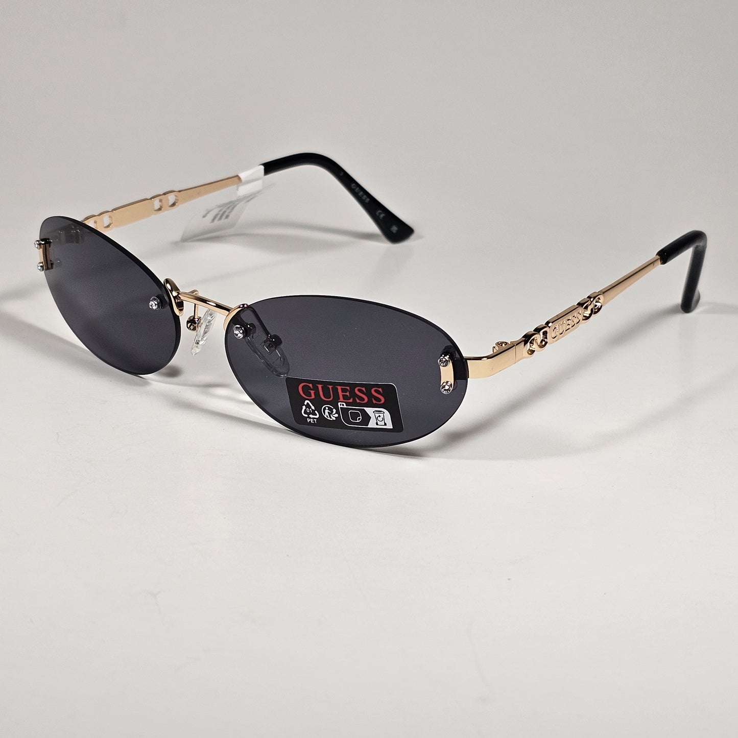Guess GO00082 32A Small Rimless Oval Sunglasses Gold Frame Gray  Tinted Lens