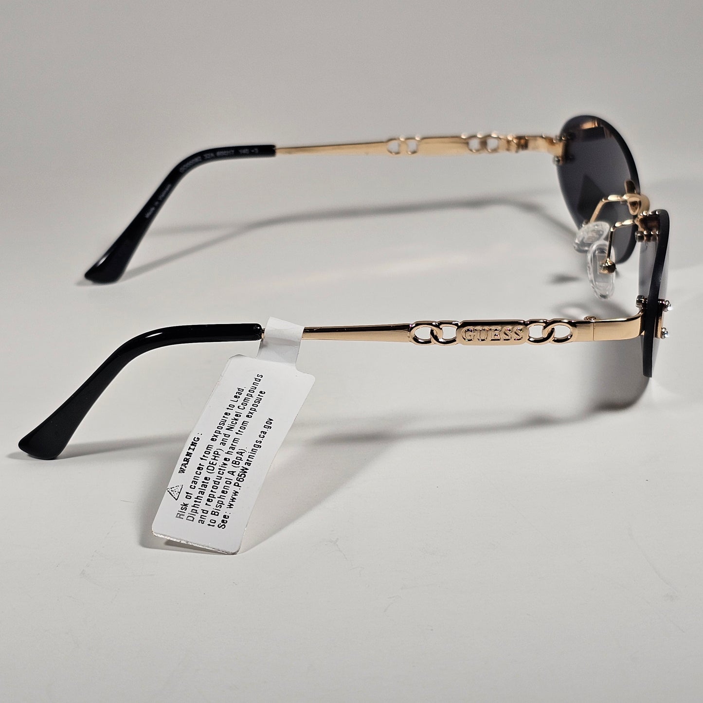 Guess GO00082 32A Small Rimless Oval Sunglasses Gold Frame Gray  Tinted Lens