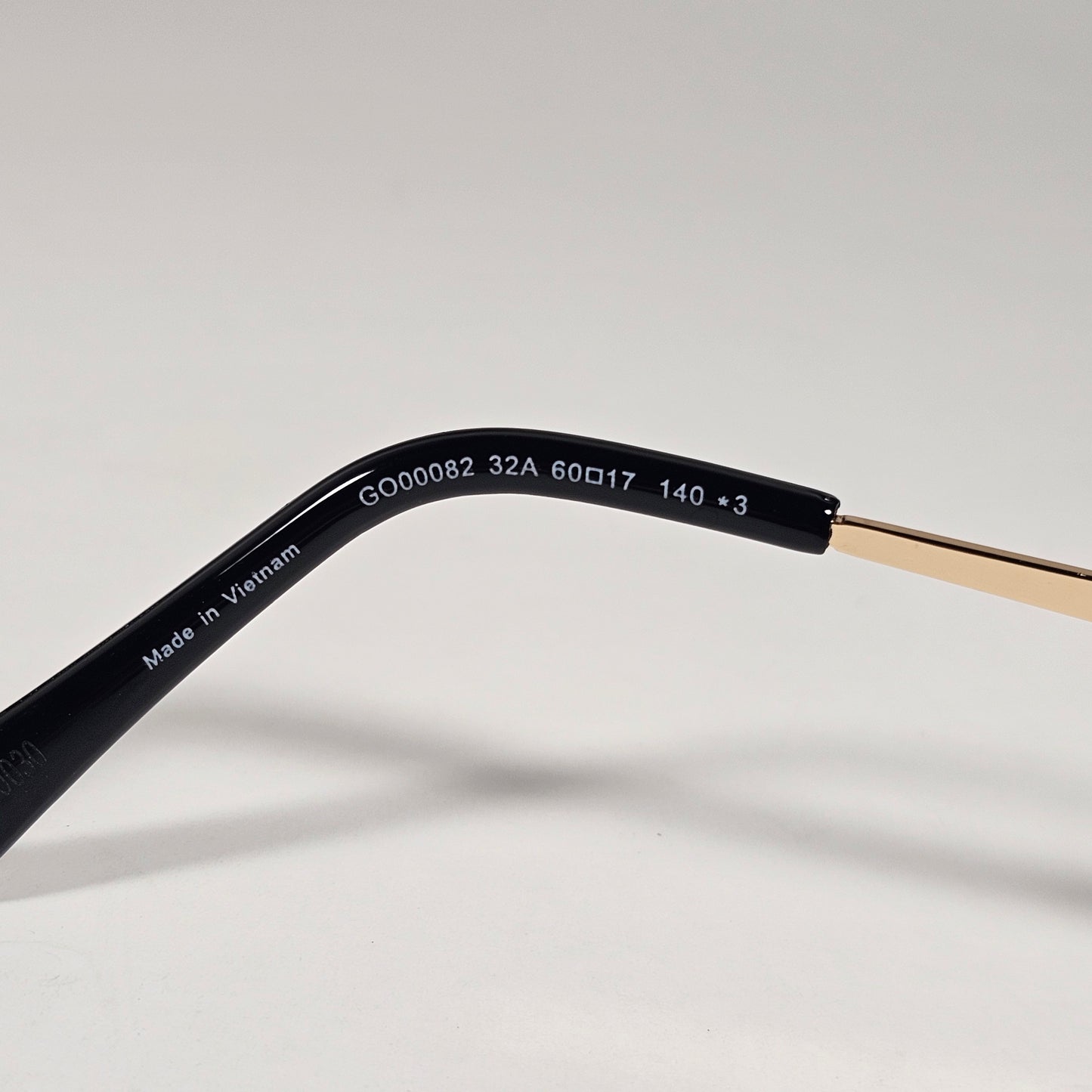 Guess GO00082 32A Small Rimless Oval Sunglasses Gold Frame Gray  Tinted Lens
