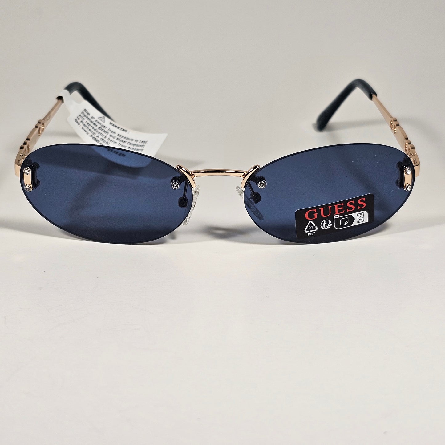 Guess GO00082 32A Small Rimless Oval Sunglasses Gold Frame Blue Tinted Lens 60mm