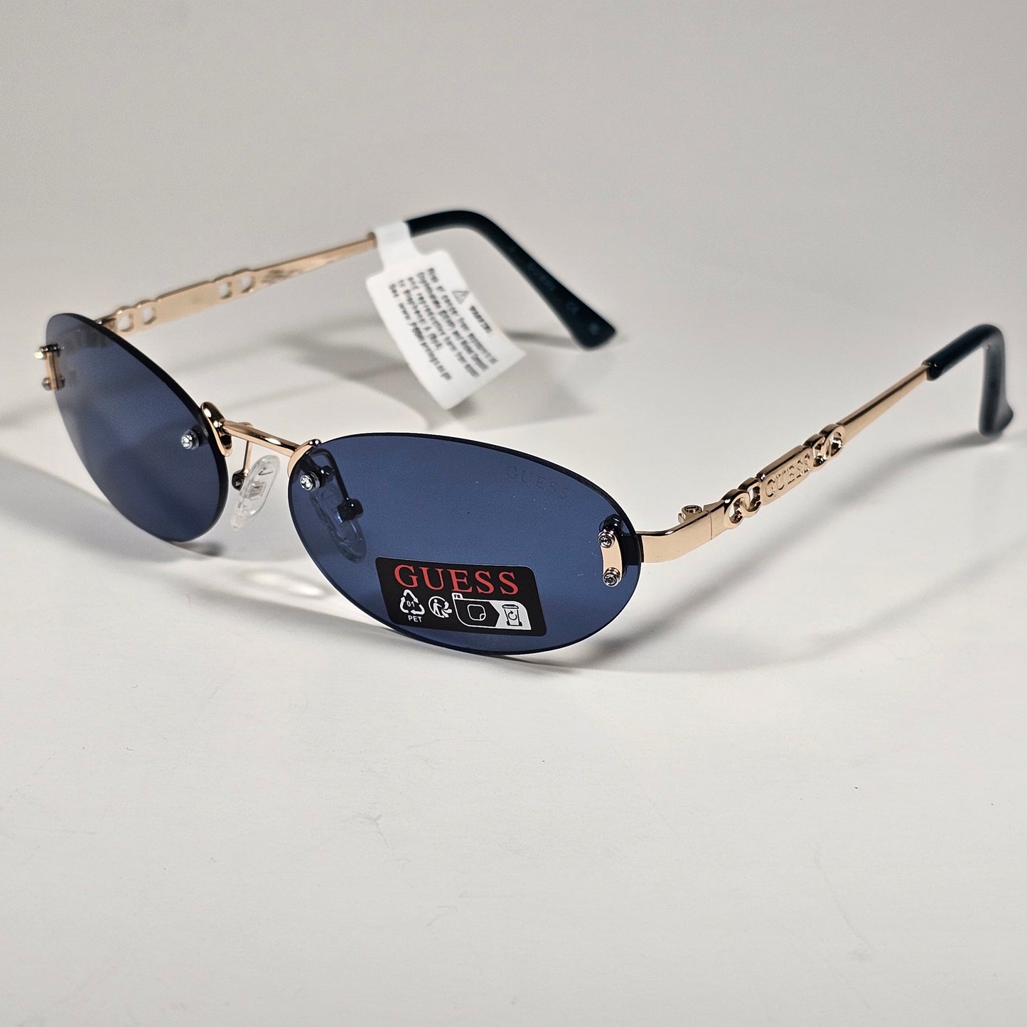 Guess GO00082 32A Small Rimless Oval Sunglasses Gold Frame Blue Tinted Lens 60mm