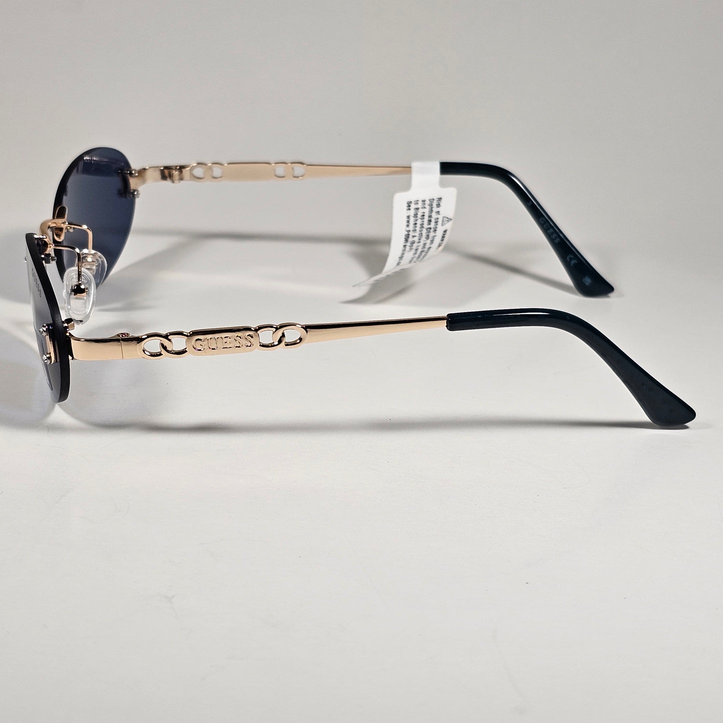 Guess GO00082 32A Small Rimless Oval Sunglasses Gold Frame Blue Tinted Lens 60mm