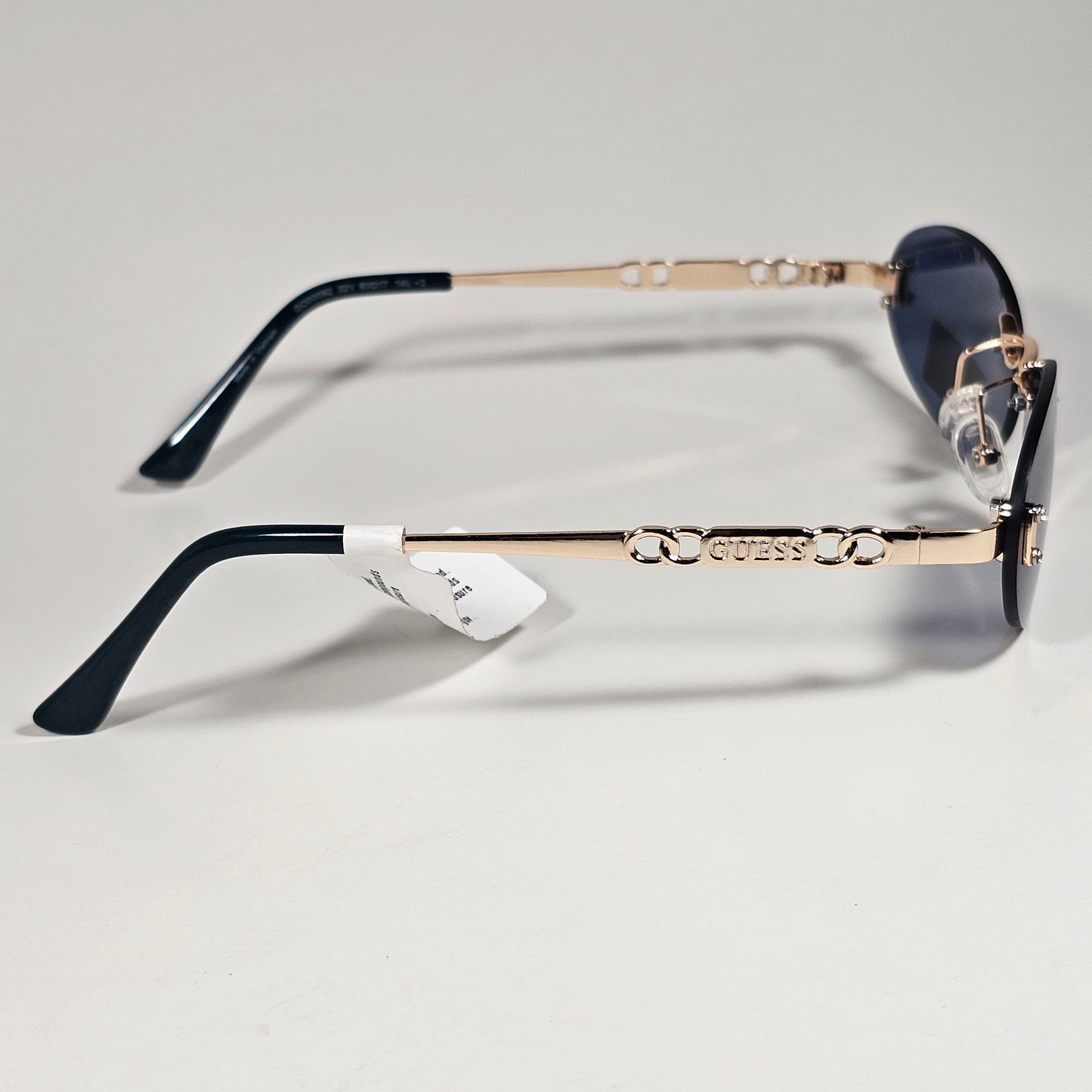 Guess GO00082 32A Small Rimless Oval Sunglasses Gold Frame Blue Tinted Lens 60mm