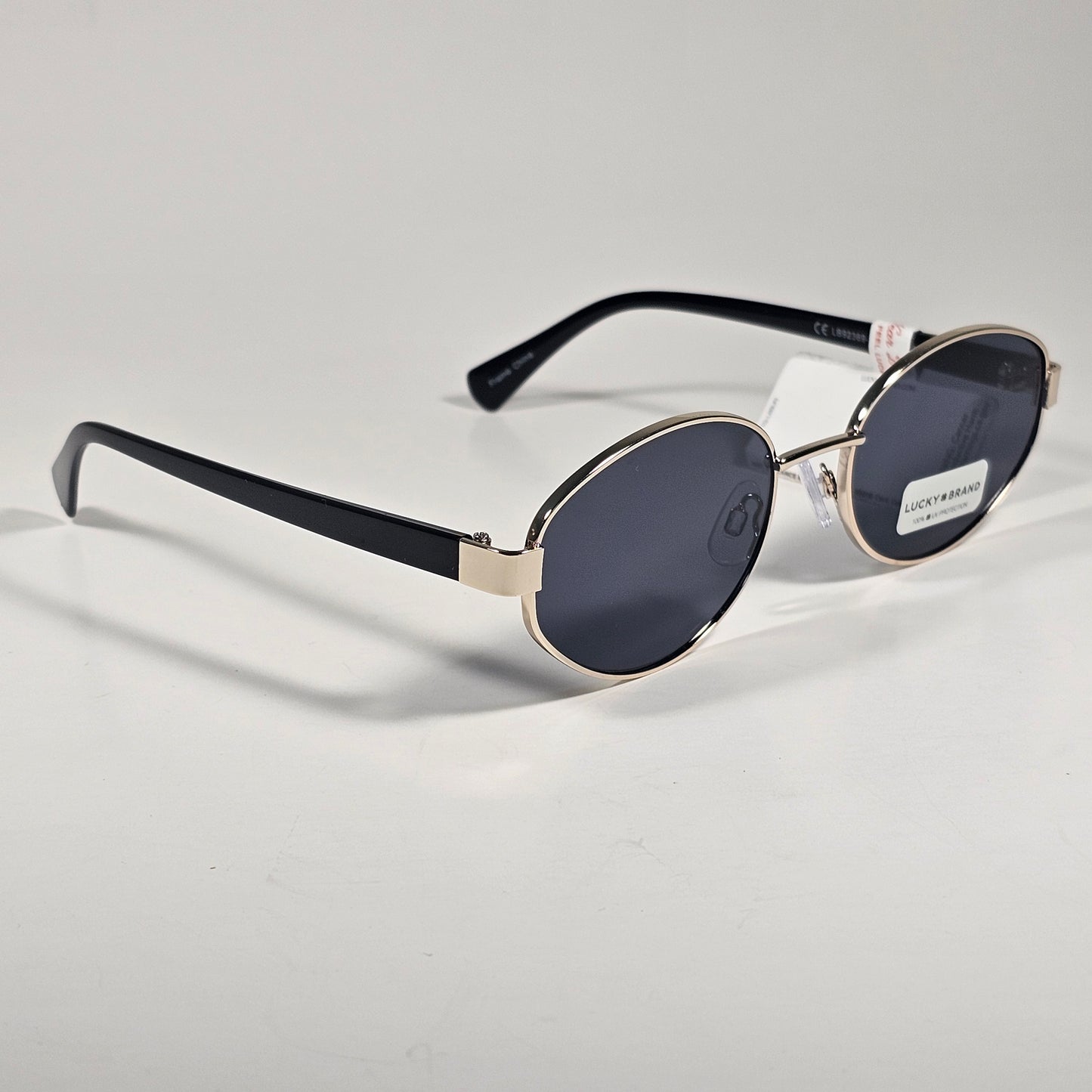 Lucky Brand LB92369 Small Oval Sunglasses Silver Black Frame Gray Tinted Lens