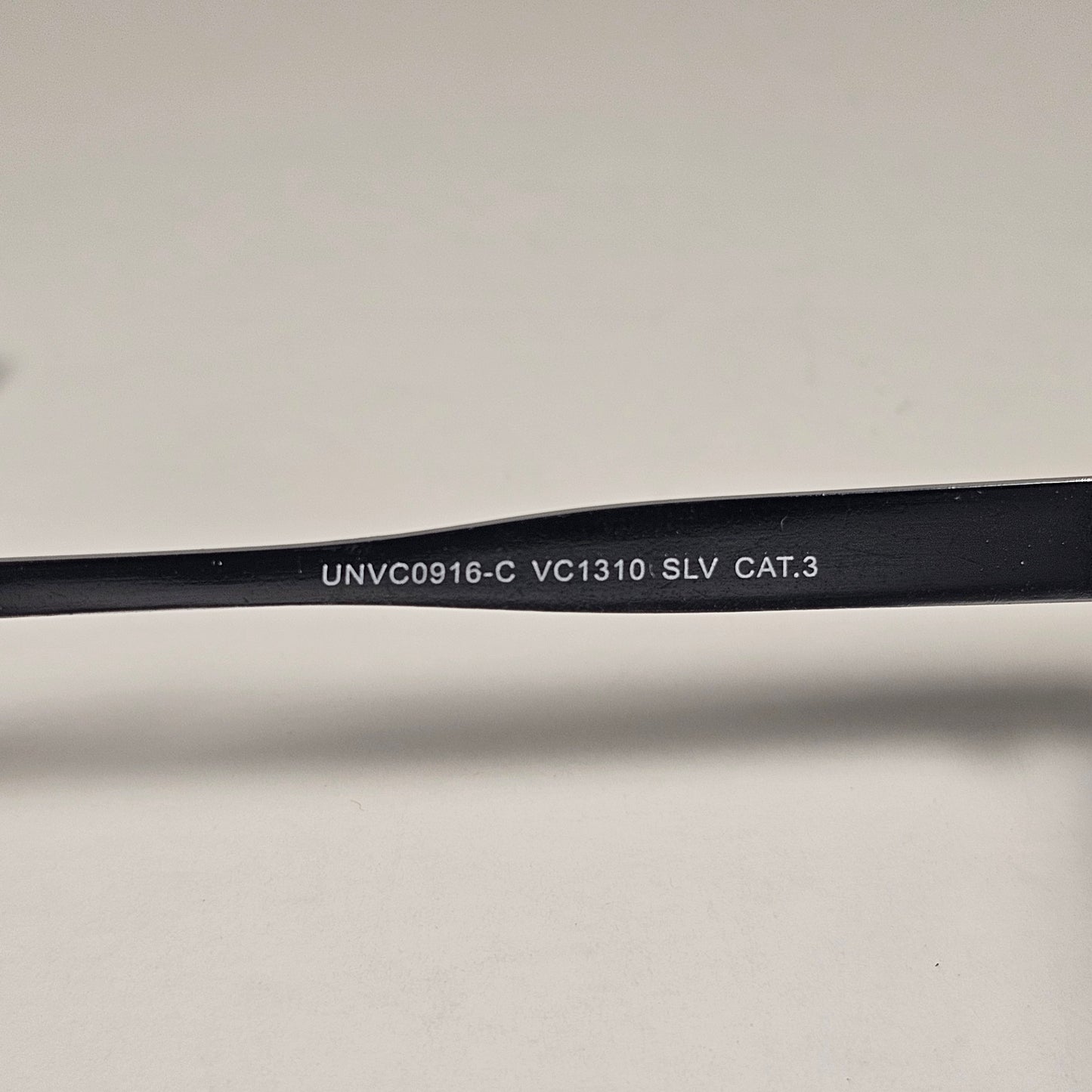 Vince Camuto VC1310 SLV Geometric Sunglasses Silver Frame Blue Tinted Lens