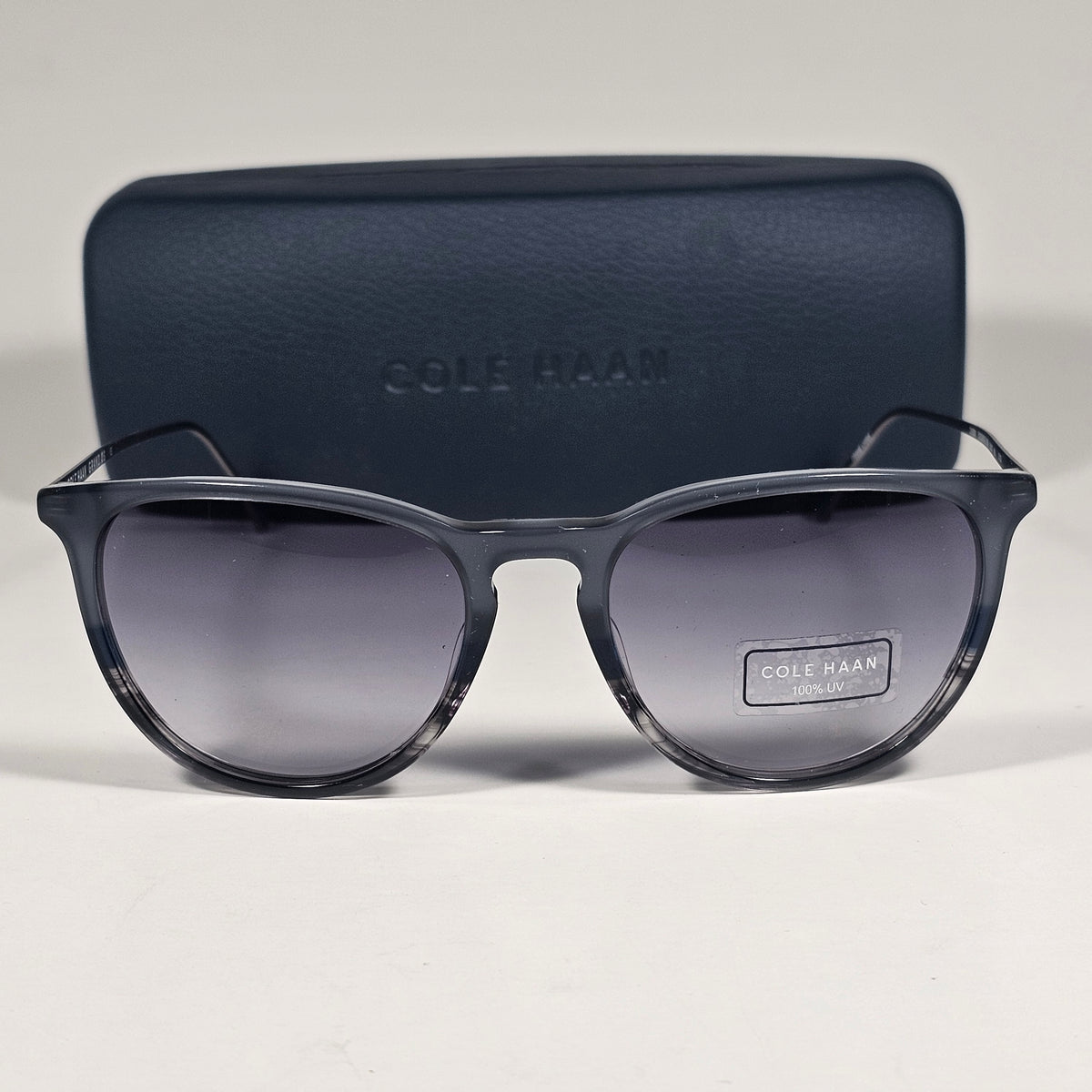 Cole Haan CH3001 036 Key Hole Ti-Flex Sunglasses Gray Smoke Horn Gray Gradient