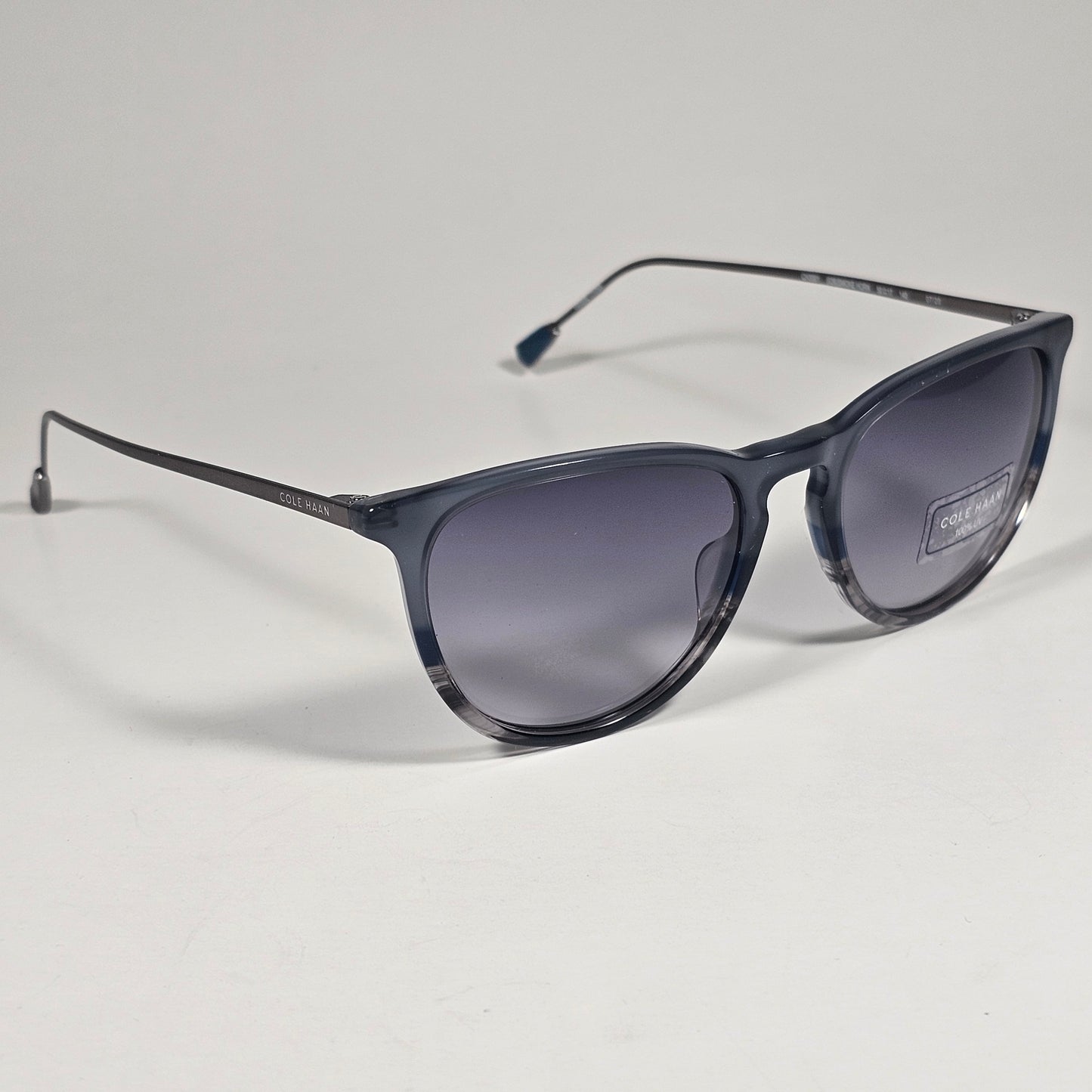 Cole Haan CH3001 036 Key Hole Ti-Flex Sunglasses Gray Smoke Horn Gray Gradient