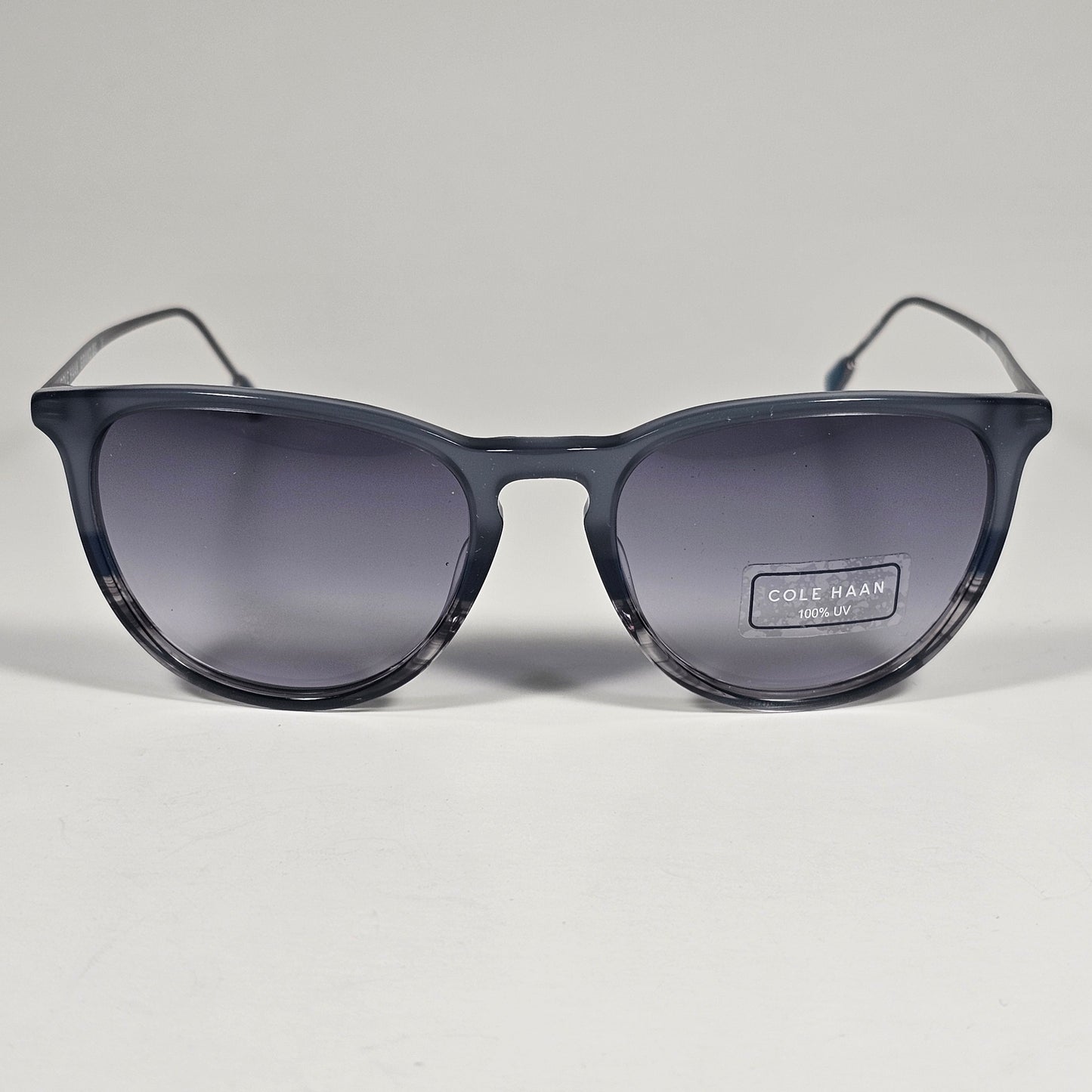 Cole Haan CH3001 036 Key Hole Ti-Flex Sunglasses Gray Smoke Horn Gray Gradient