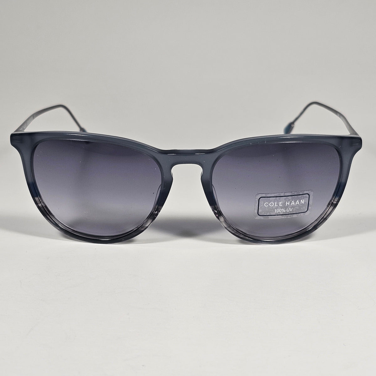 Cole Haan CH3001 036 Key Hole Ti-Flex Sunglasses Gray Smoke Horn Gray Gradient