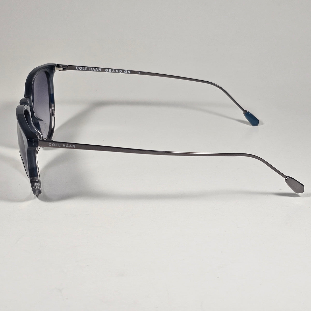 Cole Haan CH3001 036 Key Hole Ti-Flex Sunglasses Gray Smoke Horn Gray Gradient