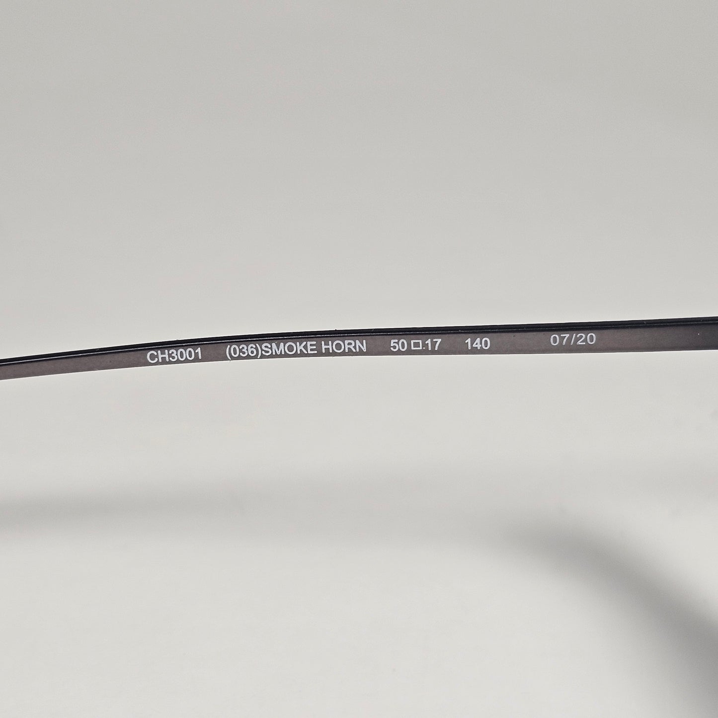 Cole Haan CH3001 036 Key Hole Ti-Flex Sunglasses Gray Smoke Horn Gray Gradient