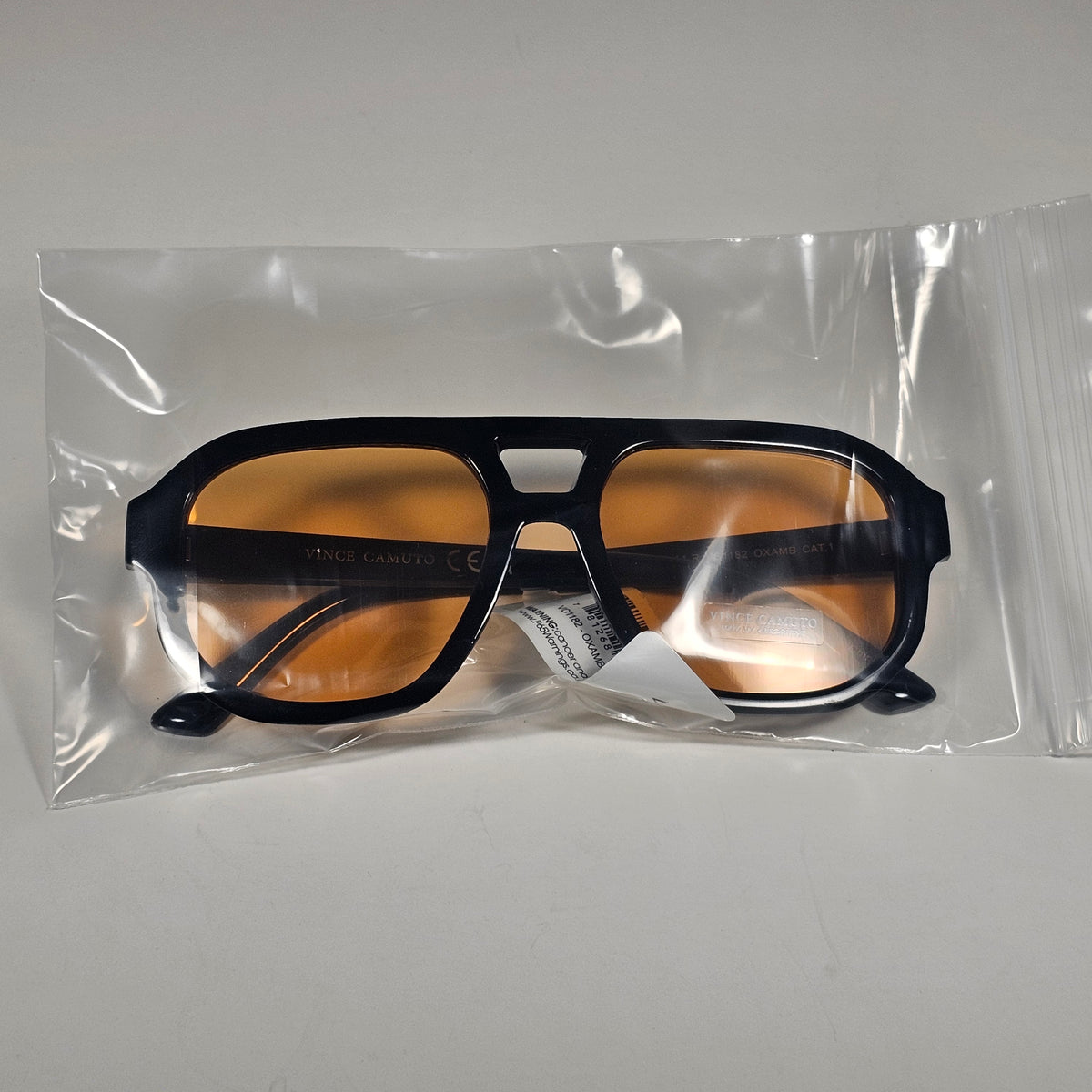 Vince Camuto VC1182 OXAMB Turbo Aviator Sunglasses Black Frame Amber Lens
