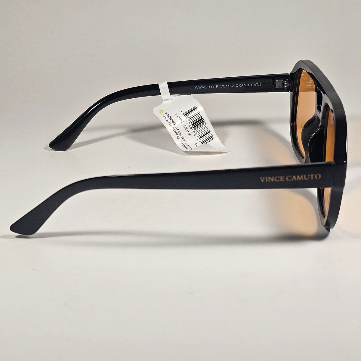 Vince Camuto VC1182 OXAMB Turbo Aviator Sunglasses Black Frame Amber Lens