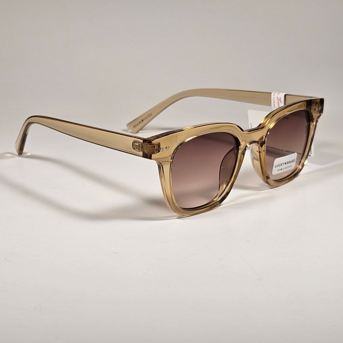 Lucky Brand LB59013 Square Rivet Sunglasses Beige Crystal Frame Brown Lens