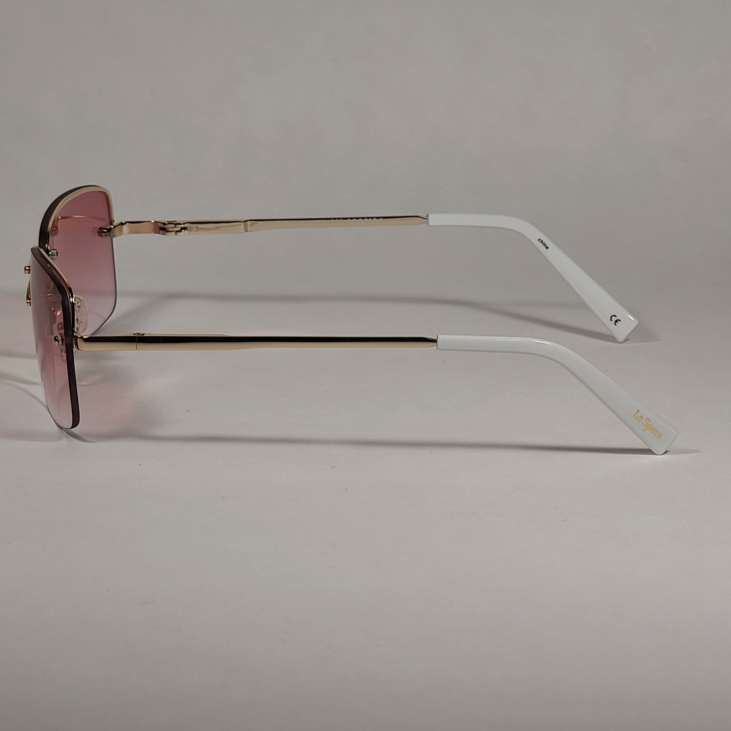 Le Specs That’s Hot Rimless Rectangle Bright Gold Frame Pink Gradient Lens LSP2002163 - Sunglasses