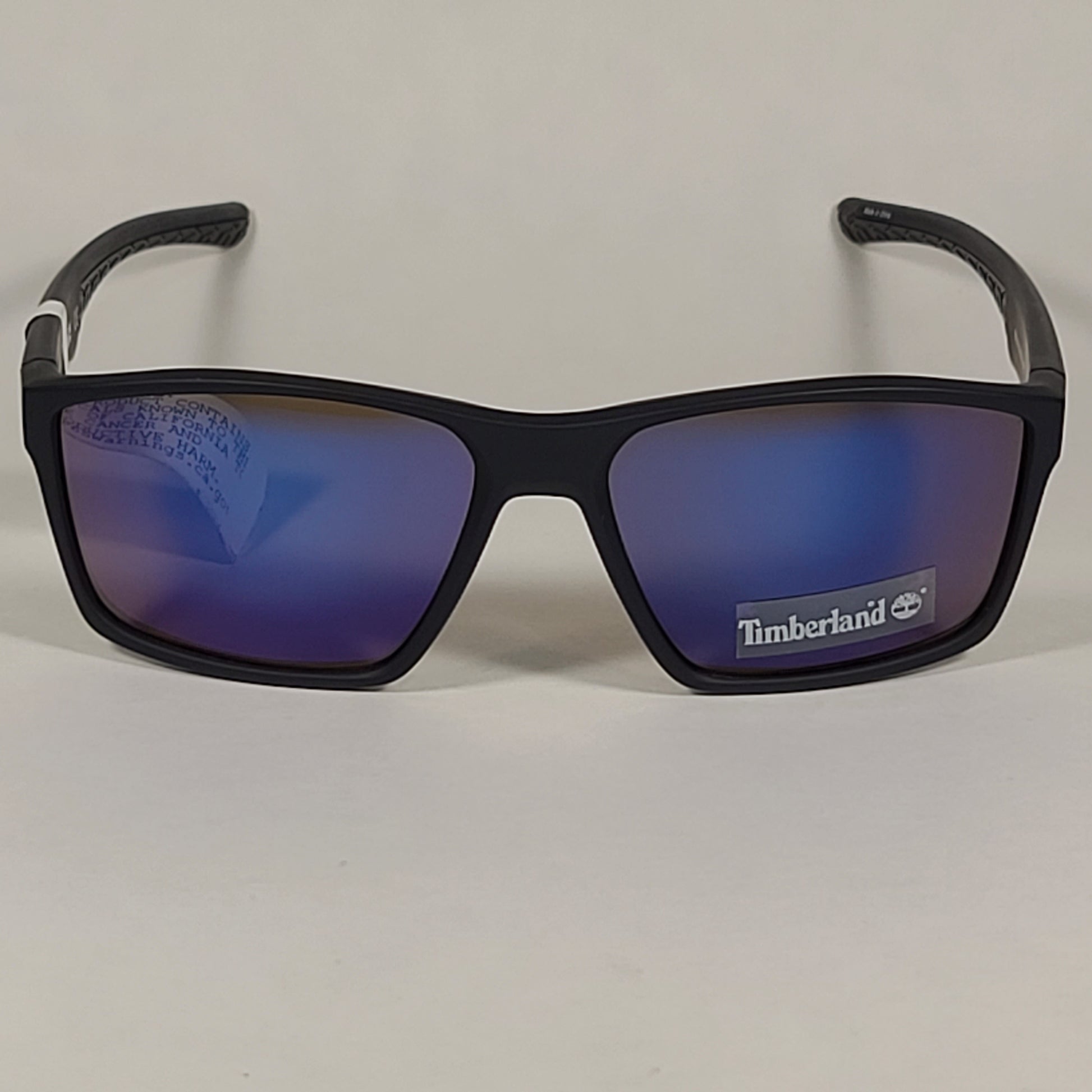 Timberland Rectangular Sunglasses Matte Black Plastic Frame Blue Violet Lens TB7218 91X - Sunglasses