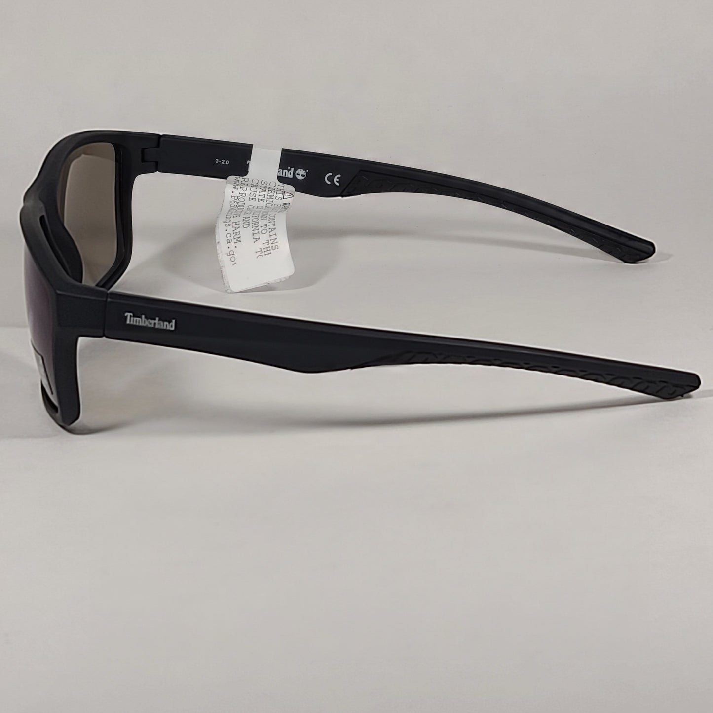 Timberland Rectangular Sunglasses Matte Black Plastic Frame Blue Violet Lens TB7218 91X - Sunglasses