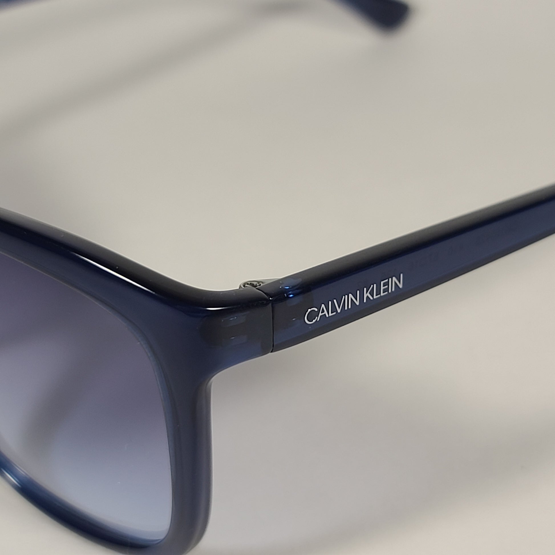 Calvin Klein Square Cat Eye Sunglasses CK19542S 605 Navy Blue Crystal Gray Gradient Lens - Sunglasses