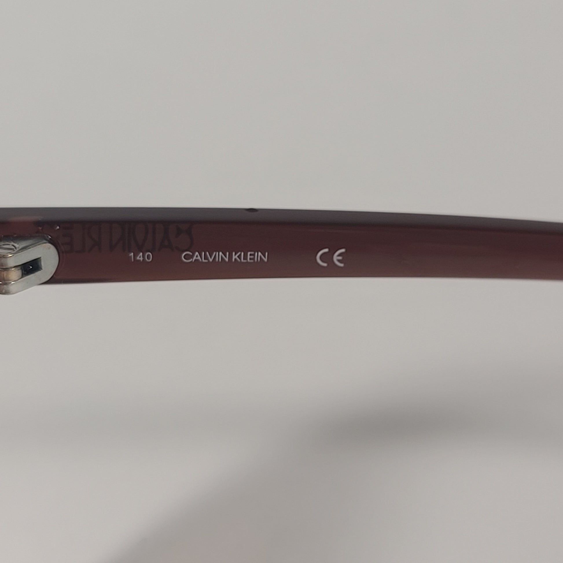 Calvin Klein CK19565S 210 Cat Eye Sunglasses Brown Frame Brown Gradient Lens - Sunglasses