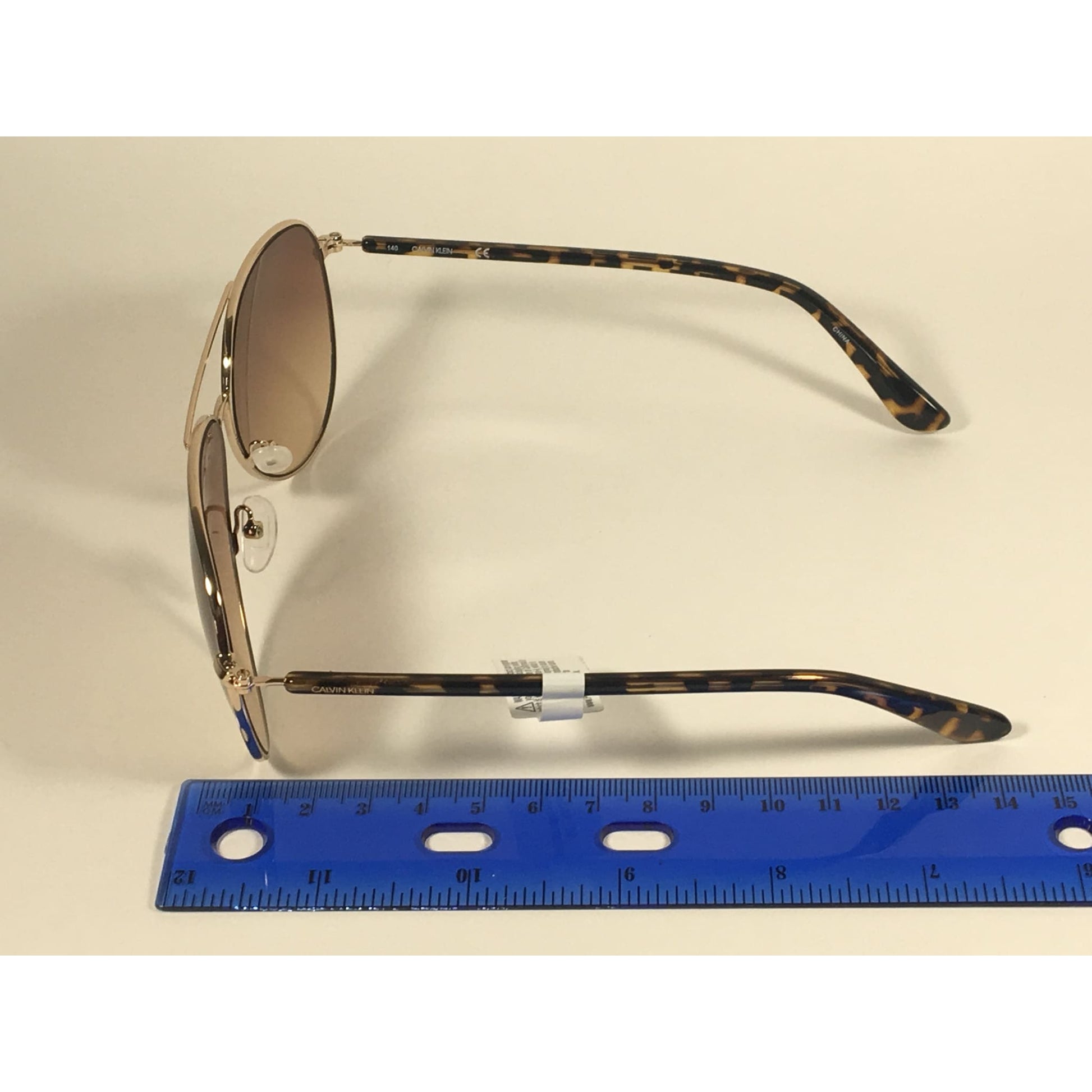 Calvin Klein CK19314S 717 Aviator Pilot Sunglasses Gold Brown Tortoise With Brown Gradient Lens - Sunglasses