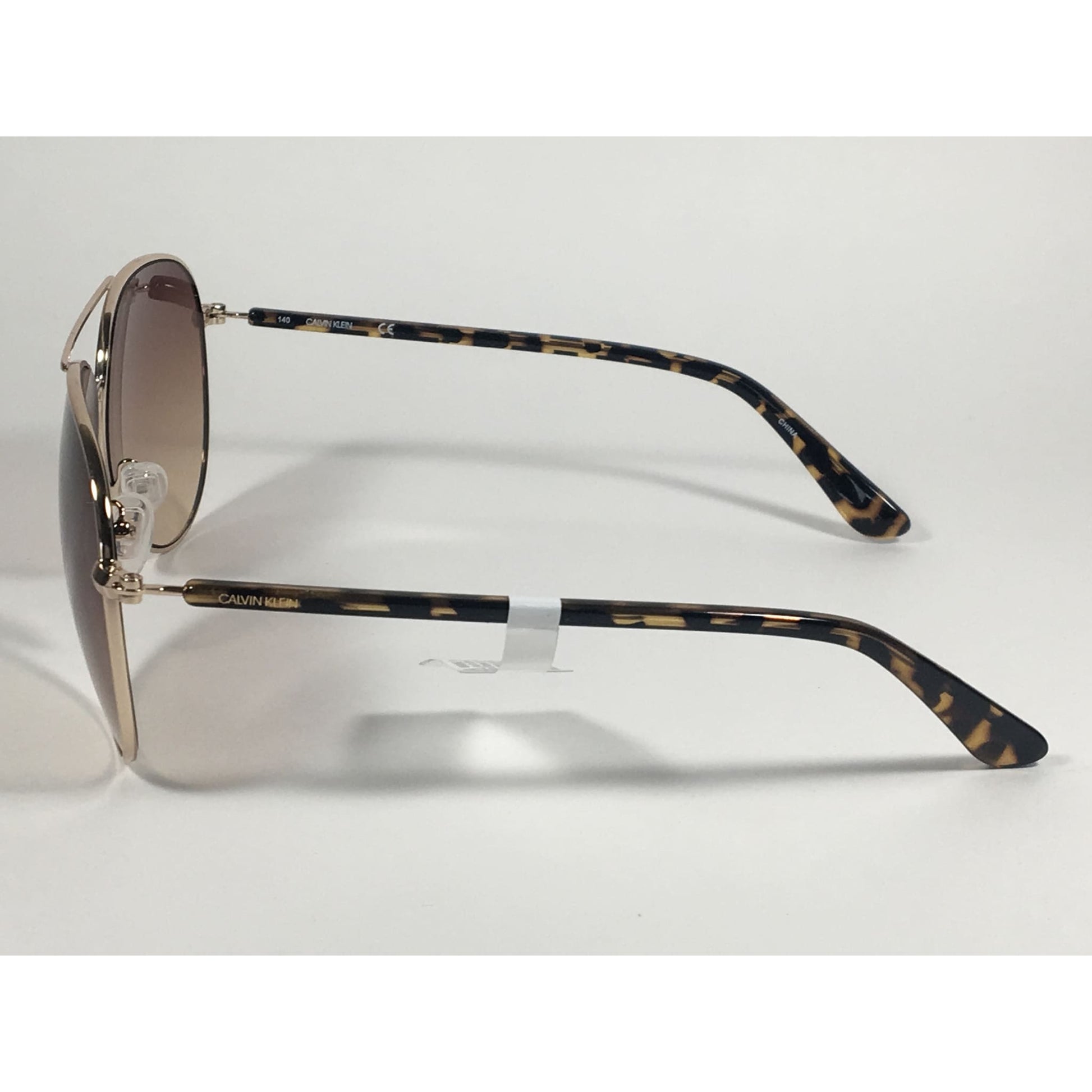 Calvin Klein CK19314S 717 Aviator Pilot Sunglasses Gold Brown Tortoise With Brown Gradient Lens - Sunglasses